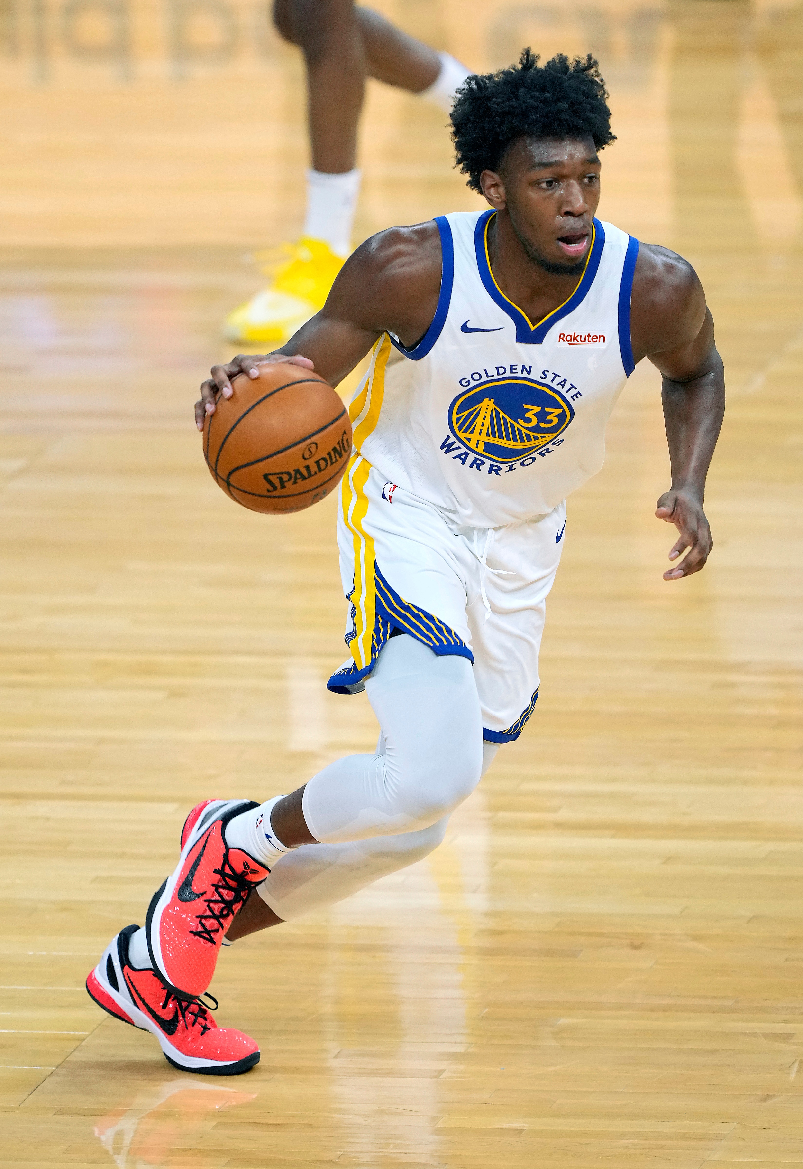 SAN FRANCISCO, CALIFORNIA - MARCH 29: James Wiseman #33 of the Golden State Warriors dribbles the ball against the Chicago Bulls during the first half of an NBA basketball game at Chase Center on March 29, 2021 in San Francisco, California. NOTE TO USER: User expressly acknowledges and agrees that, by downloading and or using this photograph, User is consenting to the terms and conditions of the Getty Images License Agreement. (Photo by Thearon W. Henderson/Getty Images)