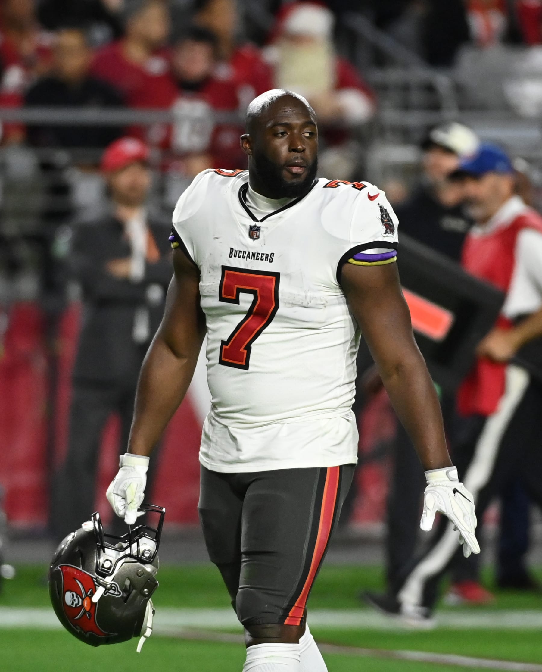 GLENDALE, ARIZONA - DECEMBER 25: Leonard Fournette #7 of the Tampa Bay Buccaneers walks up the field during a stop in play against the Arizona Cardinals at State Farm Stadium on December 25, 2022 in Glendale, Arizona. (Photo by Norm Hall/Getty Images)