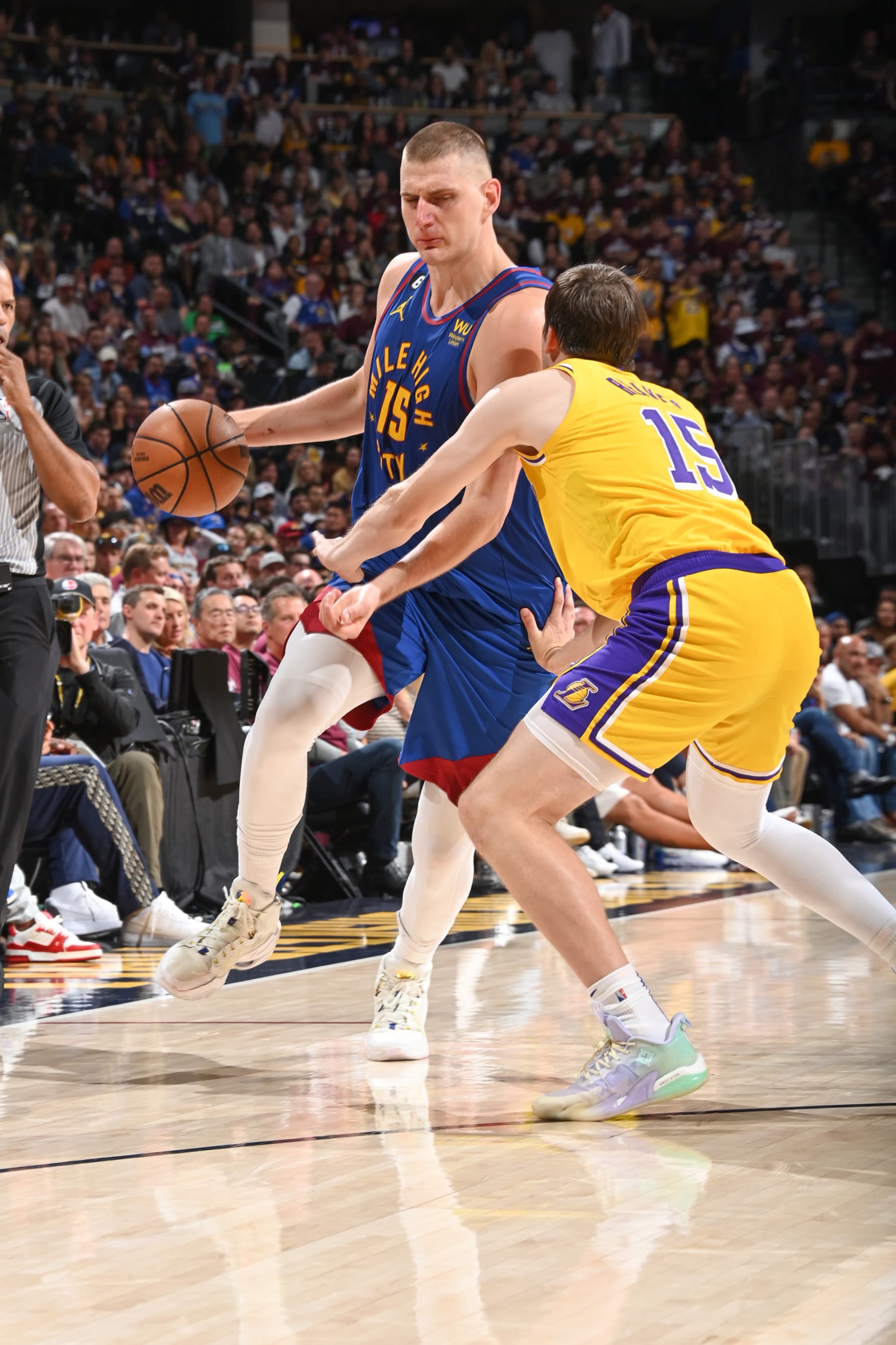 DENVER, CO - MAY 16: Nikola Jokic #15 of the Denver Nuggets goes to the basket during the game  during round 3 game 1 of the 2023 NBA Playoffs Western Conference Finals on May 16, 2023 at the Ball Arena in Denver, Colorado. NOTE TO USER: User expressly acknowledges and agrees that, by downloading and/or using this Photograph, user is consenting to the terms and conditions of the Getty Images License Agreement. Mandatory Copyright Notice: Copyright 2023 NBAE (Photo by Andrew D. Bernstein/NBAE via Getty Images)