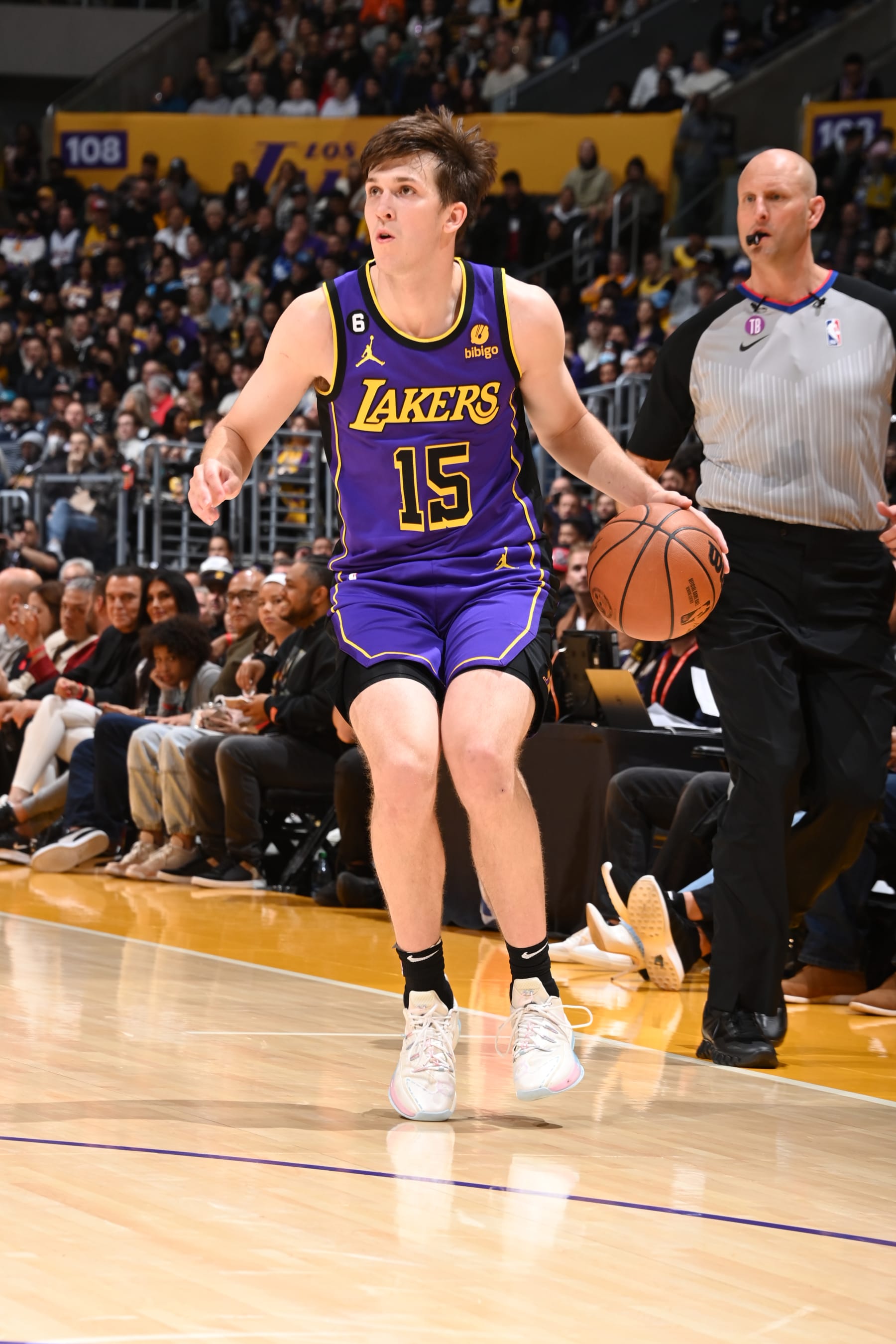 LOS ANGELES, CA - DECEMBER 16: Austin Reaves #15 of the Los Angeles Lakers dribbles the ball during the game against the Denver Nuggets on December 16, 2022 at Crypto.Com Arena in Los Angeles, California. NOTE TO USER: User expressly acknowledges and agrees that, by downloading and/or using this Photograph, user is consenting to the terms and conditions of the Getty Images License Agreement. Mandatory Copyright Notice: Copyright 2022 NBAE (Photo by Andrew D. Bernstein/NBAE via Getty Images)