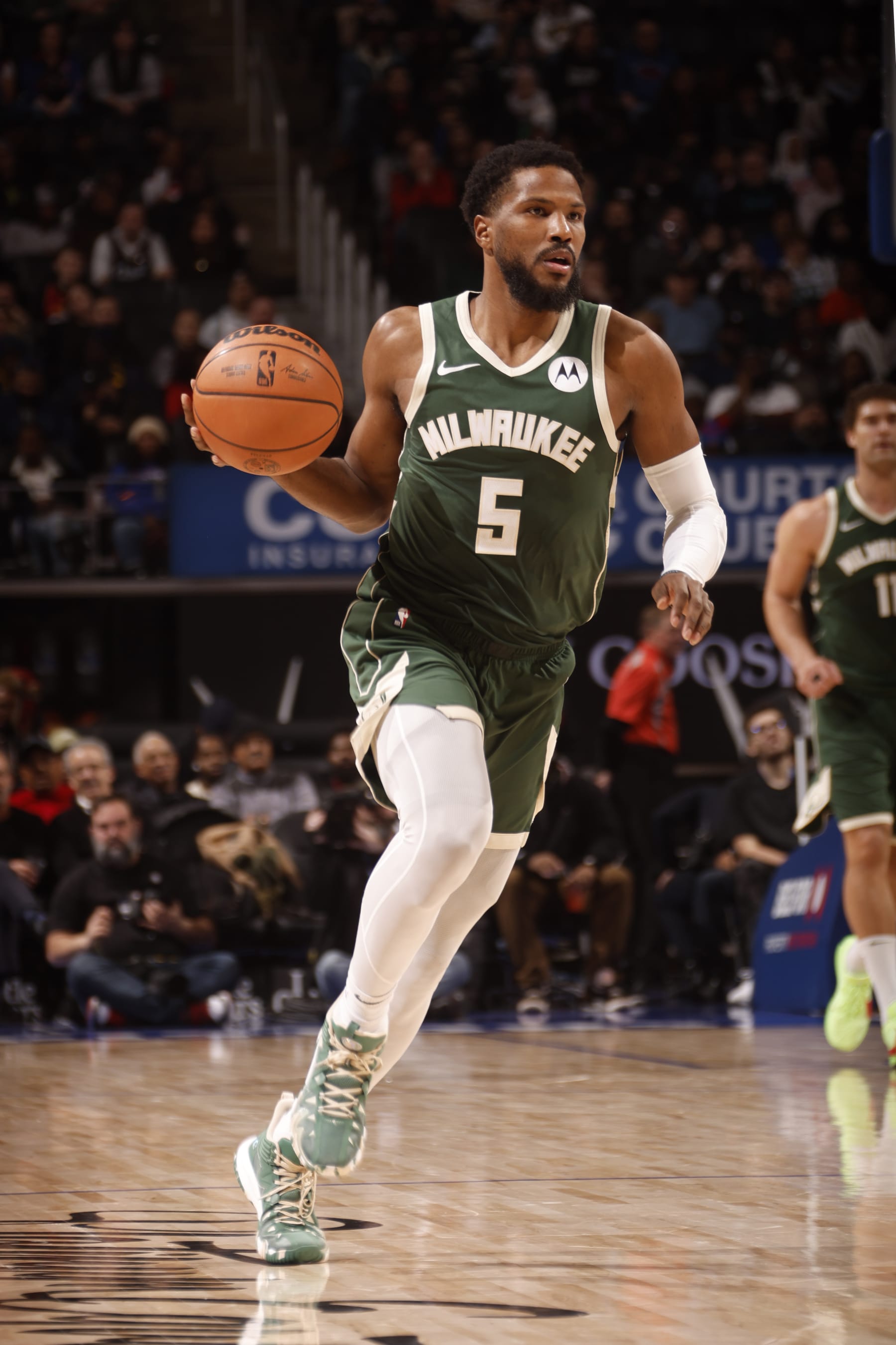 DETROIT, MI - JANUARY 22:  Malik Beasley #5 of the Milwaukee Bucks handles the ball during the game against the Detroit Pistons on January 22, 2024 at Little Caesars Arena in Detroit, Michigan. NOTE TO USER: User expressly acknowledges and agrees that, by downloading and/or using this photograph, User is consenting to the terms and conditions of the Getty Images License Agreement. Mandatory Copyright Notice: Copyright 2024 NBAE (Photo by Brian Sevald/NBAE via Getty Images)