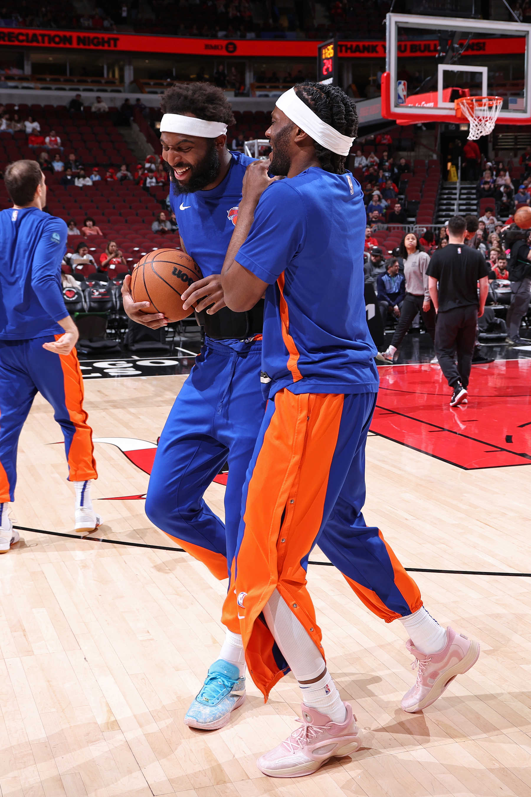 CHICAGO, IL - APRIL 9: Mitchell Robinson #23 and Precious Achiuwa #5 of the New York Knicks embrace before the game against the Chicago Bulls on April 9, 2024 at United Center in Chicago, Illinois. NOTE TO USER: User expressly acknowledges and agrees that, by downloading and or using this photograph, User is consenting to the terms and conditions of the Getty Images License Agreement. Mandatory Copyright Notice: Copyright 2024 NBAE (Photo by Jeff Haynes/NBAE via Getty Images)