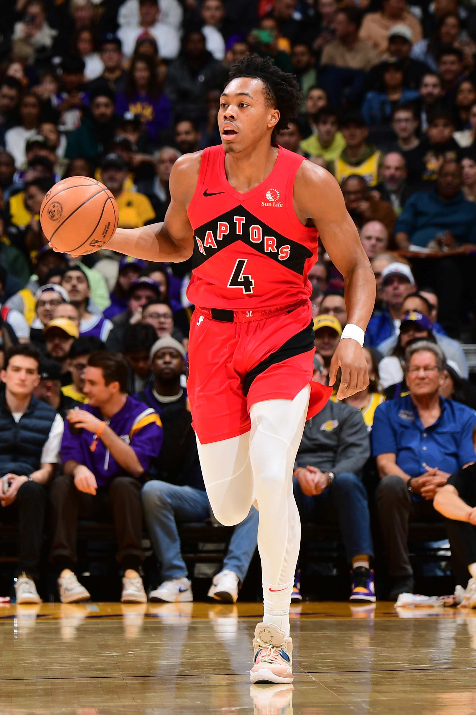 LOS ANGELES, CA - JANUARY 9: Scottie Barnes #4 of the Toronto Raptors dribbles the ball during the game against the Los Angeles Lakers on January 9, 2024 at Crypto.Com Arena in Los Angeles, California. NOTE TO USER: User expressly acknowledges and agrees that, by downloading and/or using this Photograph, user is consenting to the terms and conditions of the Getty Images License Agreement. Mandatory Copyright Notice: Copyright 2024 NBAE (Photo by Adam Pantozzi/NBAE via Getty Images)
