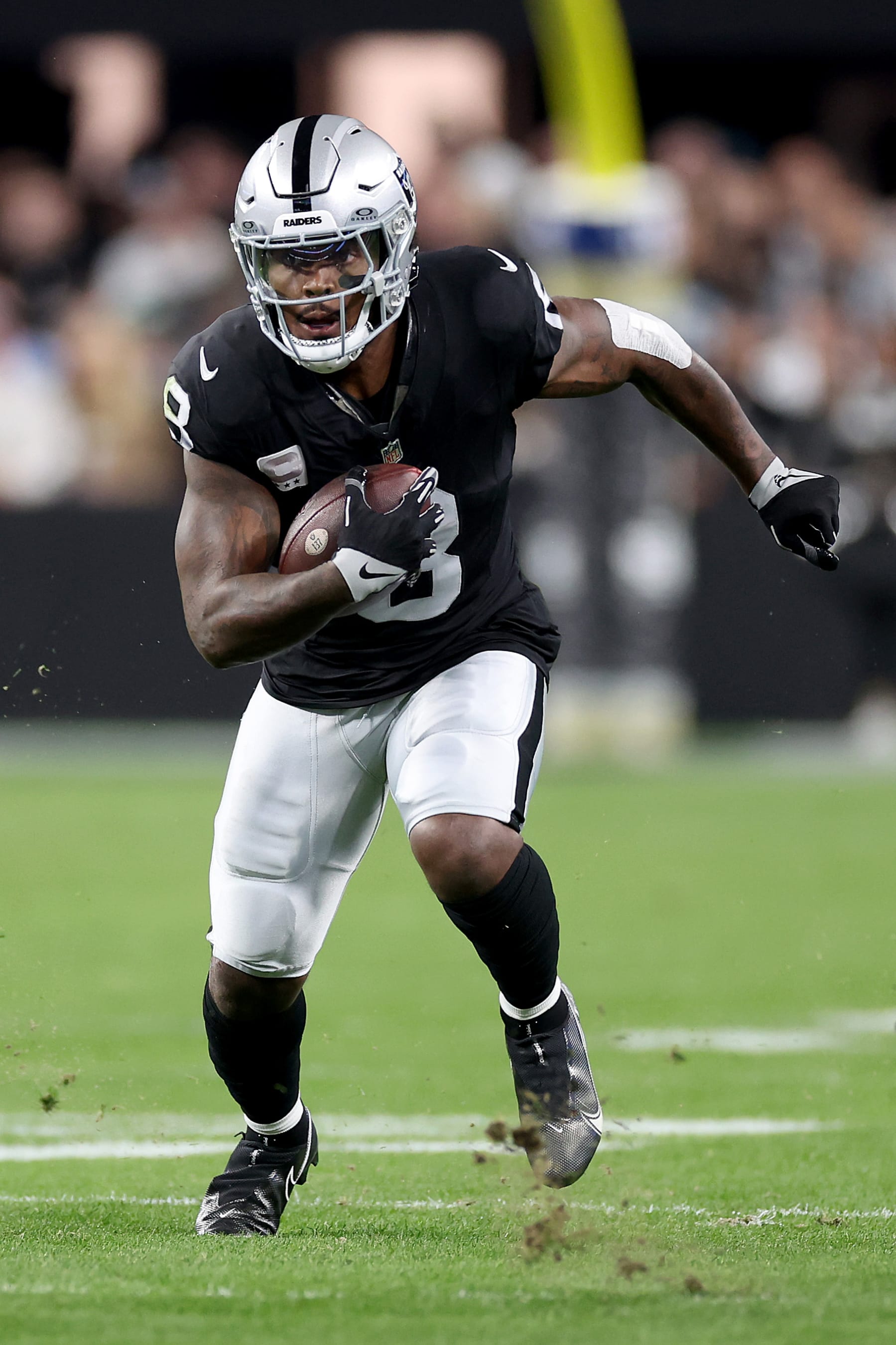 LAS VEGAS, NEVADA - NOVEMBER 12: Josh Jacobs #8 of the Las Vegas Raiders runs the ball during a game against the New York Jets at Allegiant Stadium on November 12, 2023 in Las Vegas, Nevada. (Photo by Sean M. Haffey/Getty Images)