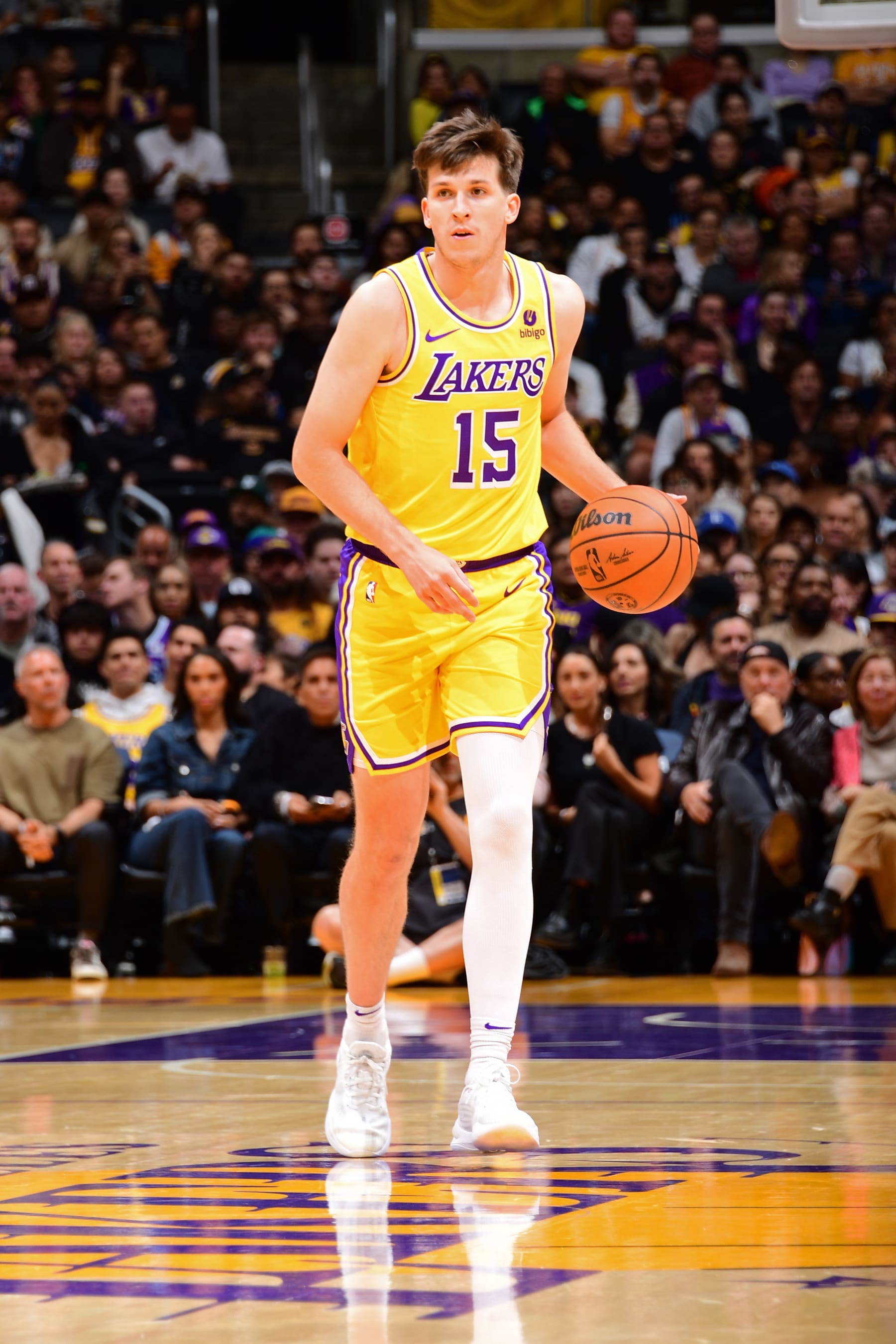 LOS ANGELES, CA - OCTOBER 30: Austin Reaves #15 of the Los Angeles Lakers dribbles the ball during the game against the Orlando Magic on October 30, 2023 at Crypto.Com Arena in Los Angeles, California. NOTE TO USER: User expressly acknowledges and agrees that, by downloading and/or using this Photograph, user is consenting to the terms and conditions of the Getty Images License Agreement. Mandatory Copyright Notice: Copyright 2023 NBAE (Photo by Adam Pantozzi/NBAE via Getty Images)