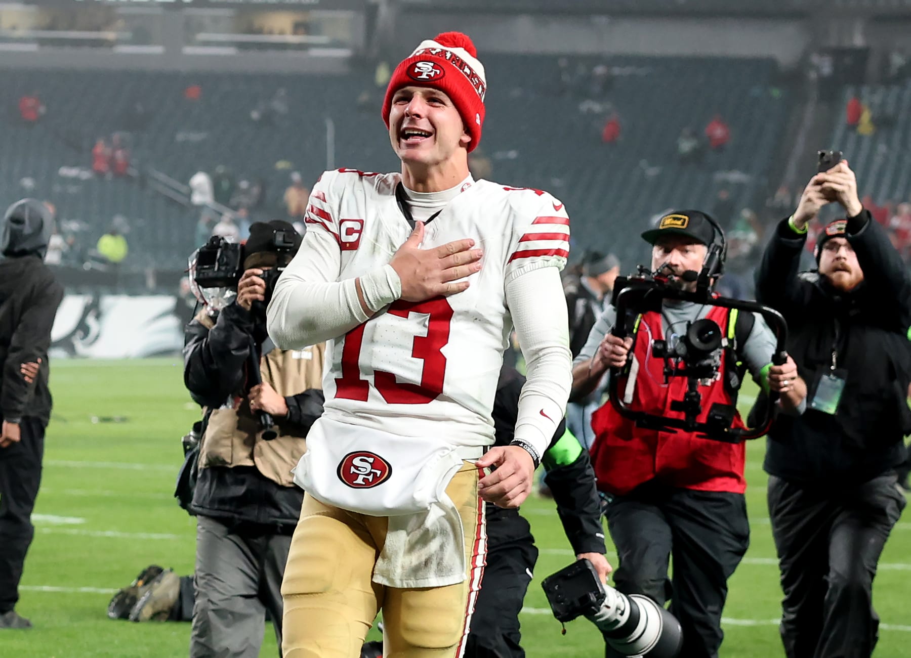 PHILADELPHIA, PENNSYLVANIA - DECEMBER 03: Brock Purdy #13 of the San Francisco 49ers celebrates a win over the Philadelphia Eagles at Lincoln Financial Field on December 03, 2023 in Philadelphia, Pennsylvania. (Photo by Tim Nwachukwu/Getty Images)