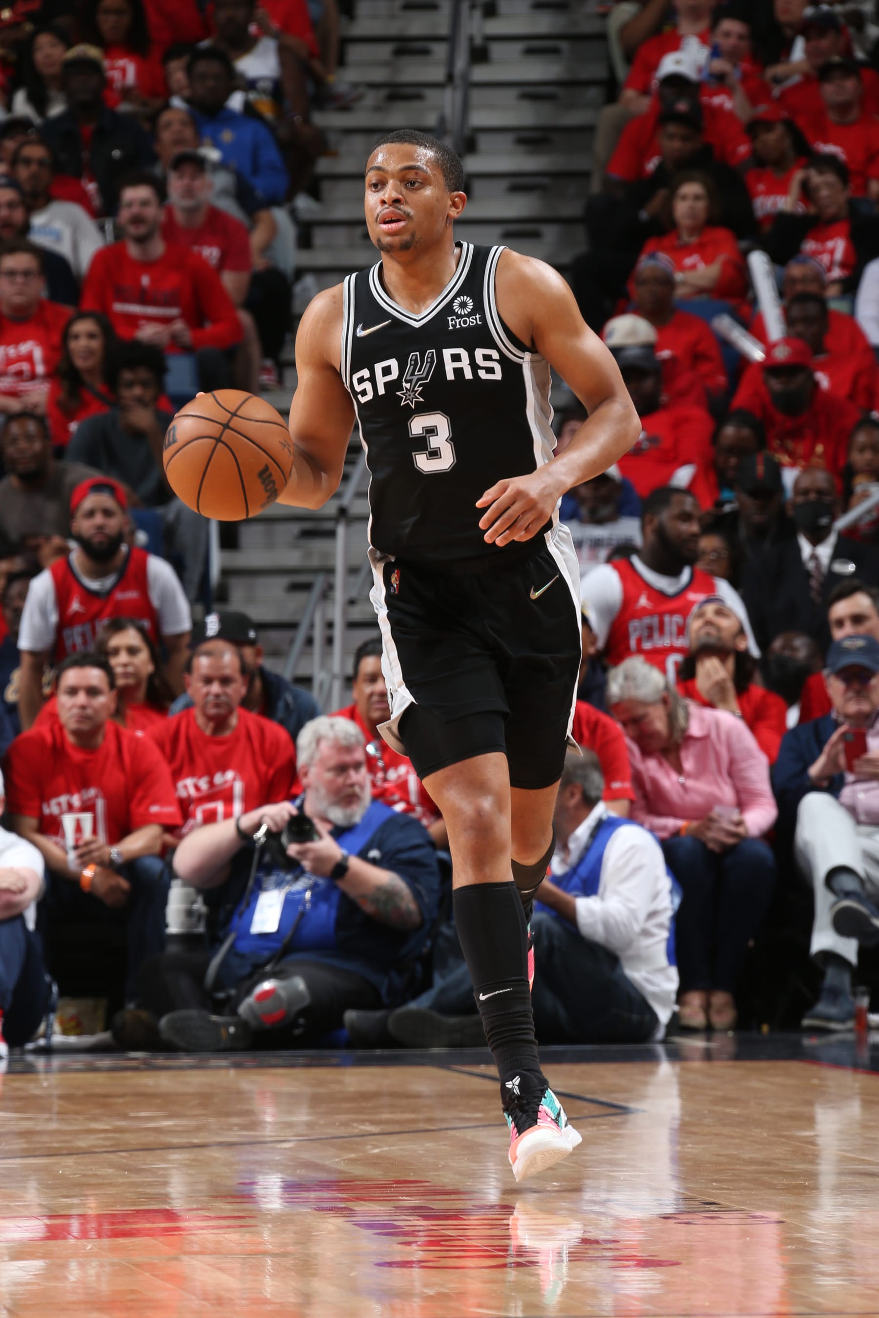 NEW ORLEANS, LA - APRIL 13: Keldon Johnson #3 of the San Antonio Spurs handles the ball during the game against the New Orleans Pelicans on April 13, 2022 at the Smoothie King Center in New Orleans, Louisiana. NOTE TO USER: User expressly acknowledges and agrees that, by downloading and or using this Photograph, user is consenting to the terms and conditions of the Getty Images License Agreement. Mandatory Copyright Notice: Copyright 2022 NBAE (Photo by Layne Murdoch Jr./NBAE via Getty Images)