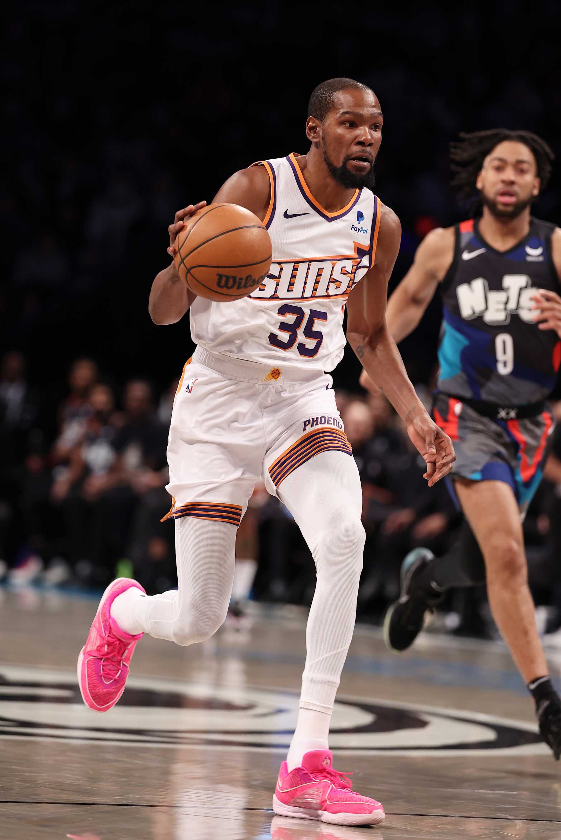 NEW YORK, NEW YORK - JANUARY 31:  Kevin Durant #35 of the Phoenix Suns in action against the Brooklyn Nets during their game at Barclays Center on January 31, 2024 in New York City.  User expressly acknowledges and agrees that, by downloading and or using this photograph, User is consenting to the terms and conditions of the Getty Images License Agreement.  (Photo by Al Bello/Getty Images)