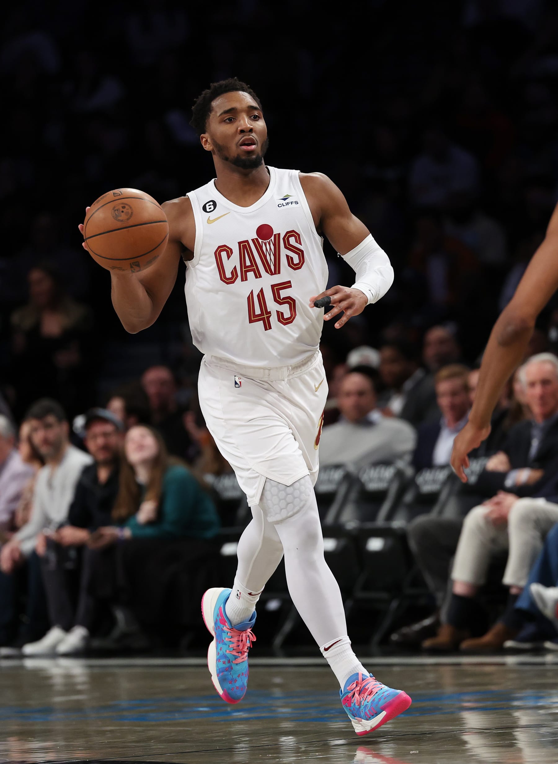 NEW YORK, NEW YORK - MARCH 21:   Donovan Mitchell #45 of the Cleveland Cavaliers dribbles against the Brooklyn Nets during their game at Barclays Center on March 21, 2023 in New York City.  User expressly acknowledges and agrees that, by downloading and or using this photograph, User is consenting to the terms and conditions of the Getty Images License Agreement.  (Photo by Al Bello/Getty Images)