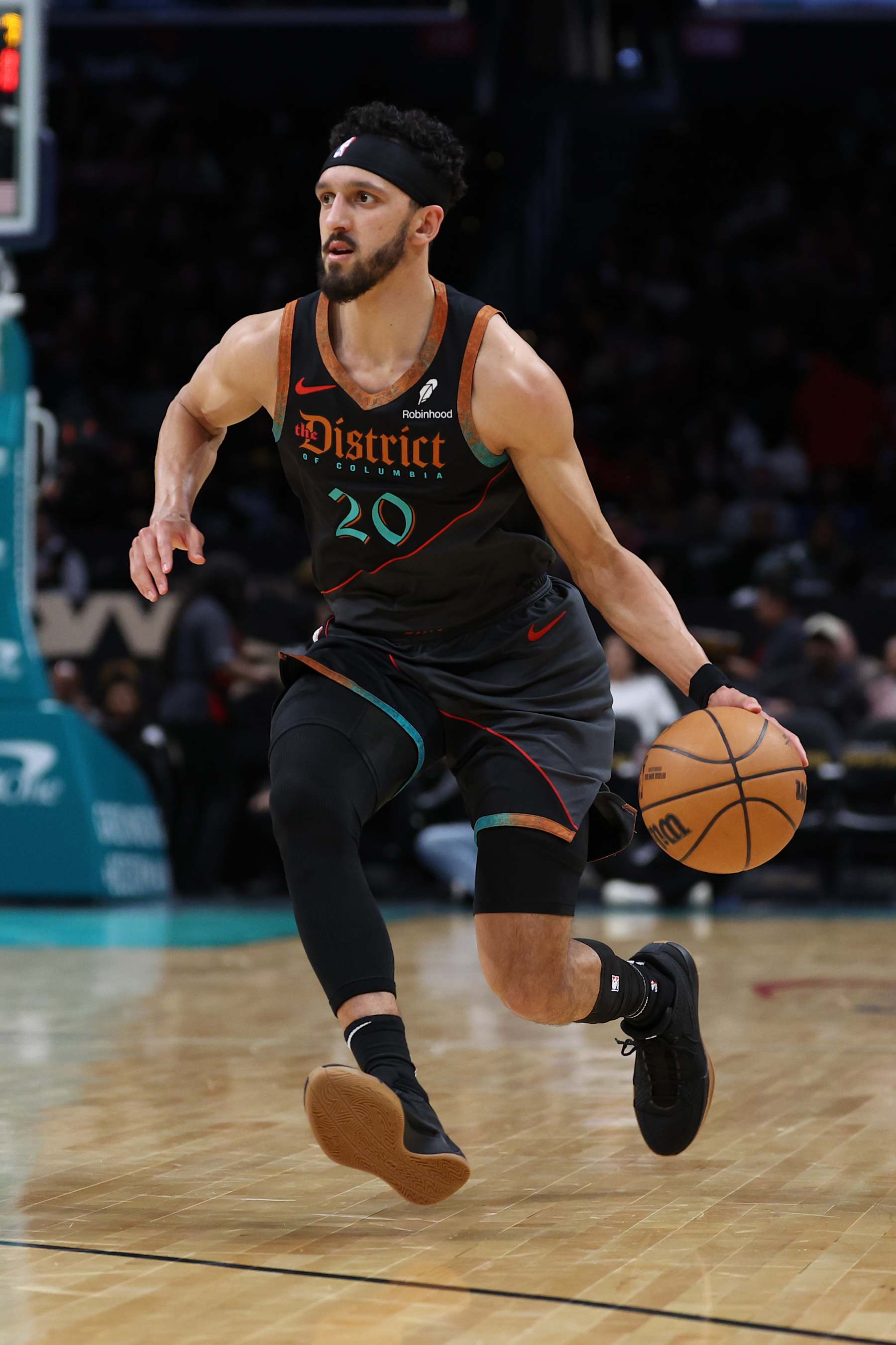 WASHINGTON, DC - FEBRUARY 25: Landry Shamet #20 of the Washington Wizards dribbles against the Cleveland Cavaliers at Capital One Arena on February 25, 2024 in Washington, DC. NOTE TO USER: User expressly acknowledges and agrees that, by downloading and or using this photograph, User is consenting to the terms and conditions of the Getty Images License Agreement. (Photo by Patrick Smith/Getty Images)