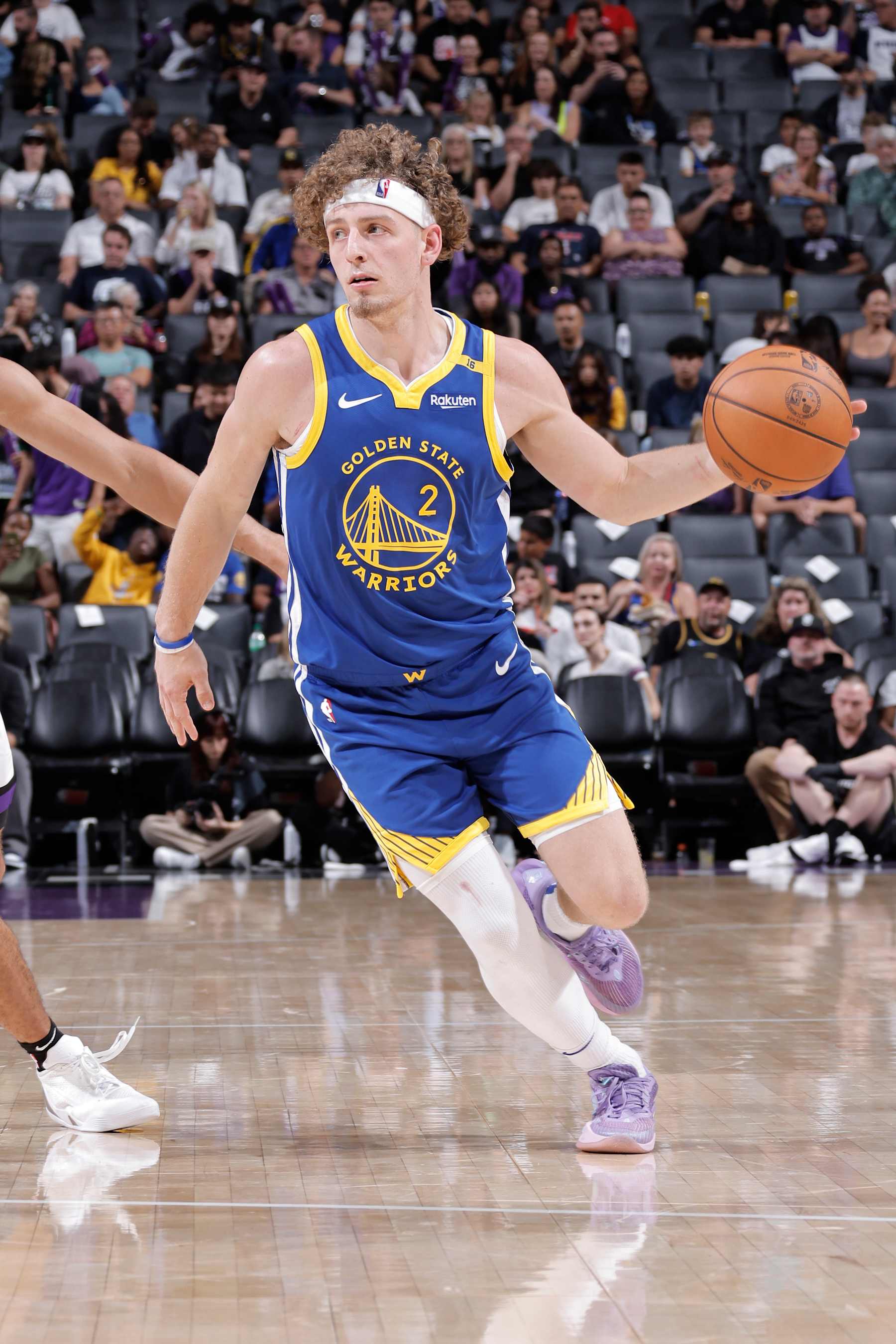 SACRAMENTO, CA - OCTOBER 9: Brandin Podziemski #2 of the Golden State Warriors dribbles the ball during the game against the Sacramento Kings during a NBA preseason game on October 9, 2024 at Golden 1 Center in Sacramento, California. NOTE TO USER: User expressly acknowledges and agrees that, by downloading and or using this Photograph, user is consenting to the terms and conditions of the Getty Images License Agreement. Mandatory Copyright Notice: Copyright 2024 NBAE (Photo by Rocky Widner/NBAE via Getty Images)