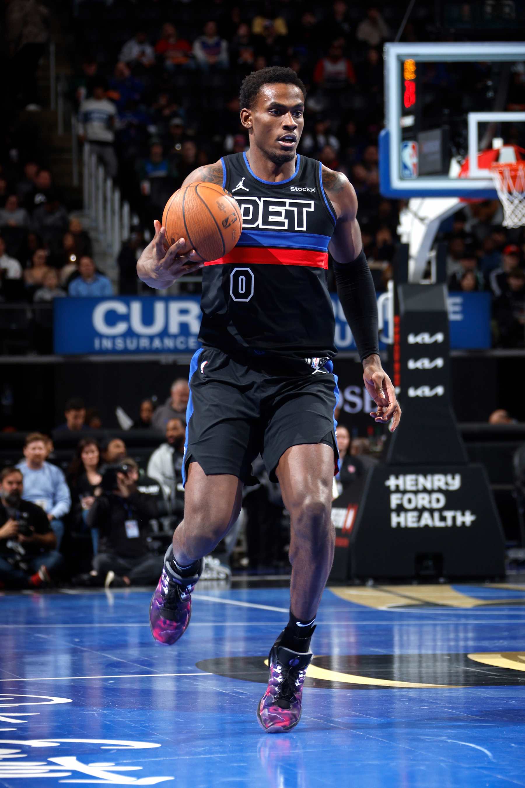 DETROIT, MI - DECEMBER 3: Jalen Duren #0 of the Detroit Pistons dribbles the ball during the game against the Milwaukee Bucks during the Emirates NBA Cup game on December 3, 2024 at Little Caesars Arena in Detroit, Michigan. NOTE TO USER: User expressly acknowledges and agrees that, by downloading and/or using this photograph, User is consenting to the terms and conditions of the Getty Images License Agreement. Mandatory Copyright Notice: Copyright 2024 NBAE (Photo by Brian Sevald/NBAE via Getty Images)