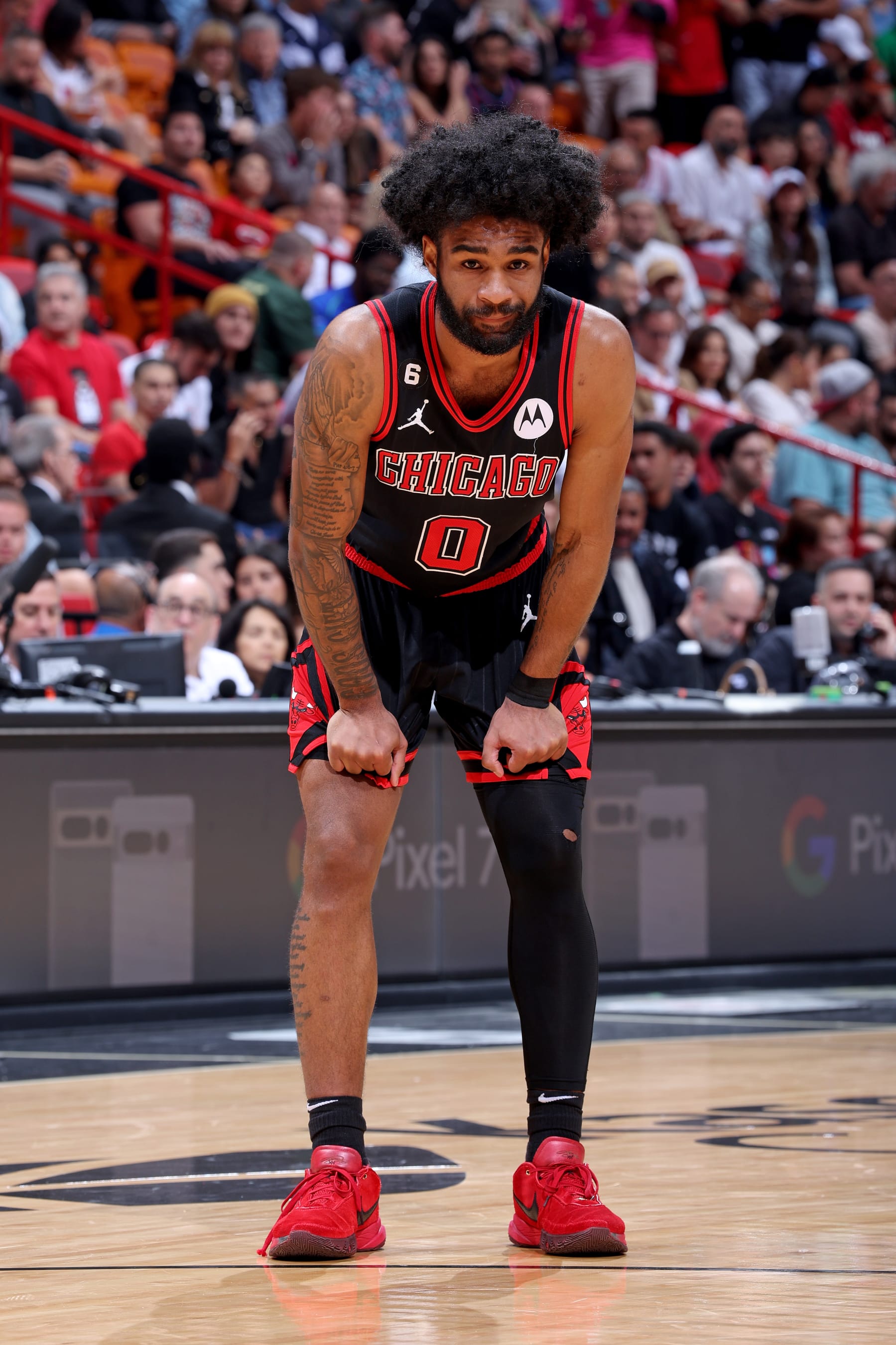 MIAMI, FL - APRIL 14: Coby White #0 of the Chicago Bulls looks on during the game against the Miami Heat During the 2023 Play-in Tournament on April 14, 2023 at Kaseya Center in Miami, Florida. NOTE TO USER: User expressly acknowledges and agrees that, by downloading and or using this photograph, User is consenting to the terms and conditions of the Getty Images License Agreement. Mandatory Copyright Notice: Copyright 2023 NBAE (Photo by Jeff Haynes/NBAE via Getty Images)