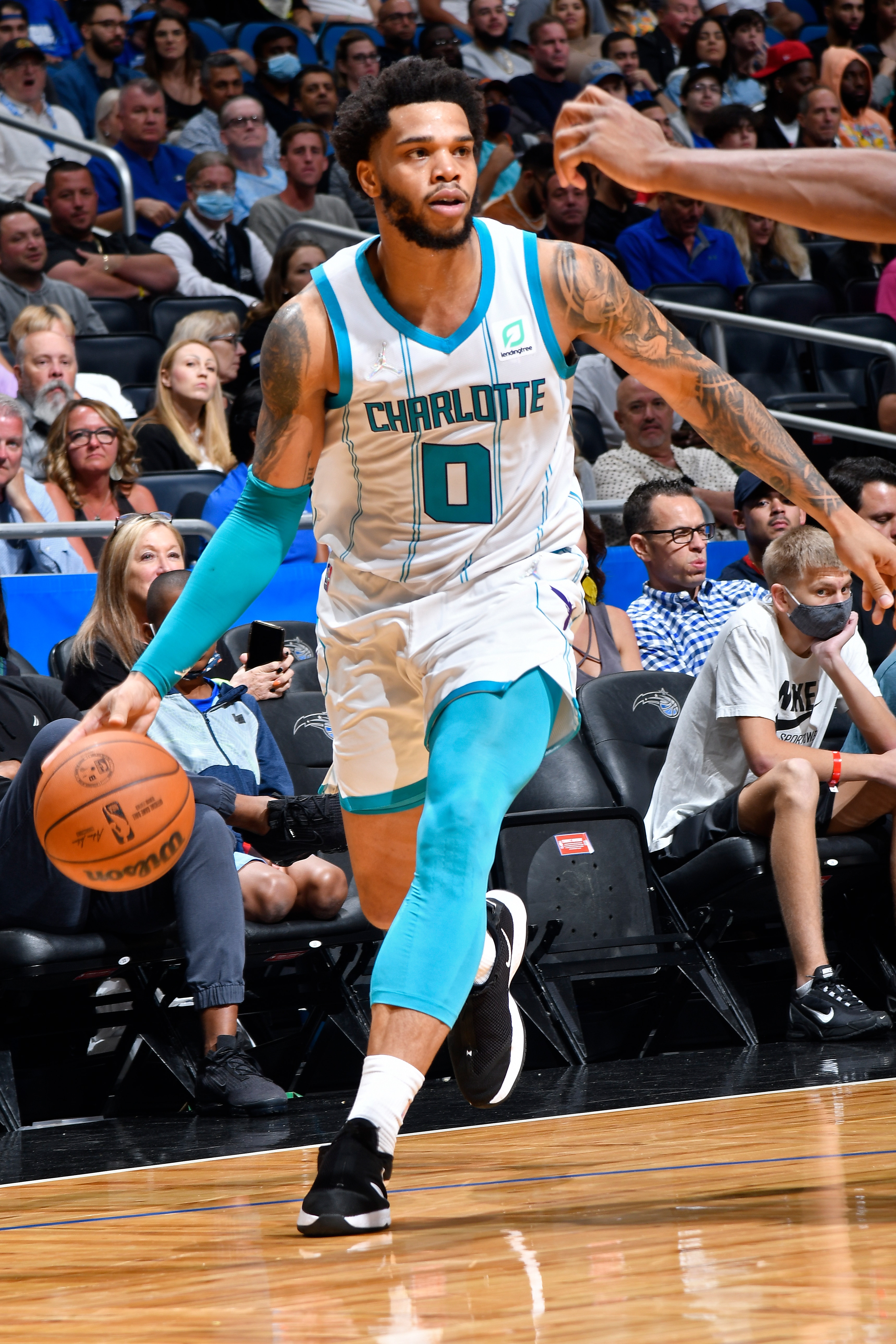 ORLANDO, FL - OCTOBER 27: Miles Bridges #0 of the Charlotte Hornets dribbles the ball against the Orlando Magic on October 27, 2021 at Amway Center in Orlando, Florida. NOTE TO USER: User expressly acknowledges and agrees that, by downloading and or using this photograph, User is consenting to the terms and conditions of the Getty Images License Agreement. Mandatory Copyright Notice: Copyright 2021 NBAE (Photo by Fernando Medina/NBAE via Getty Images)