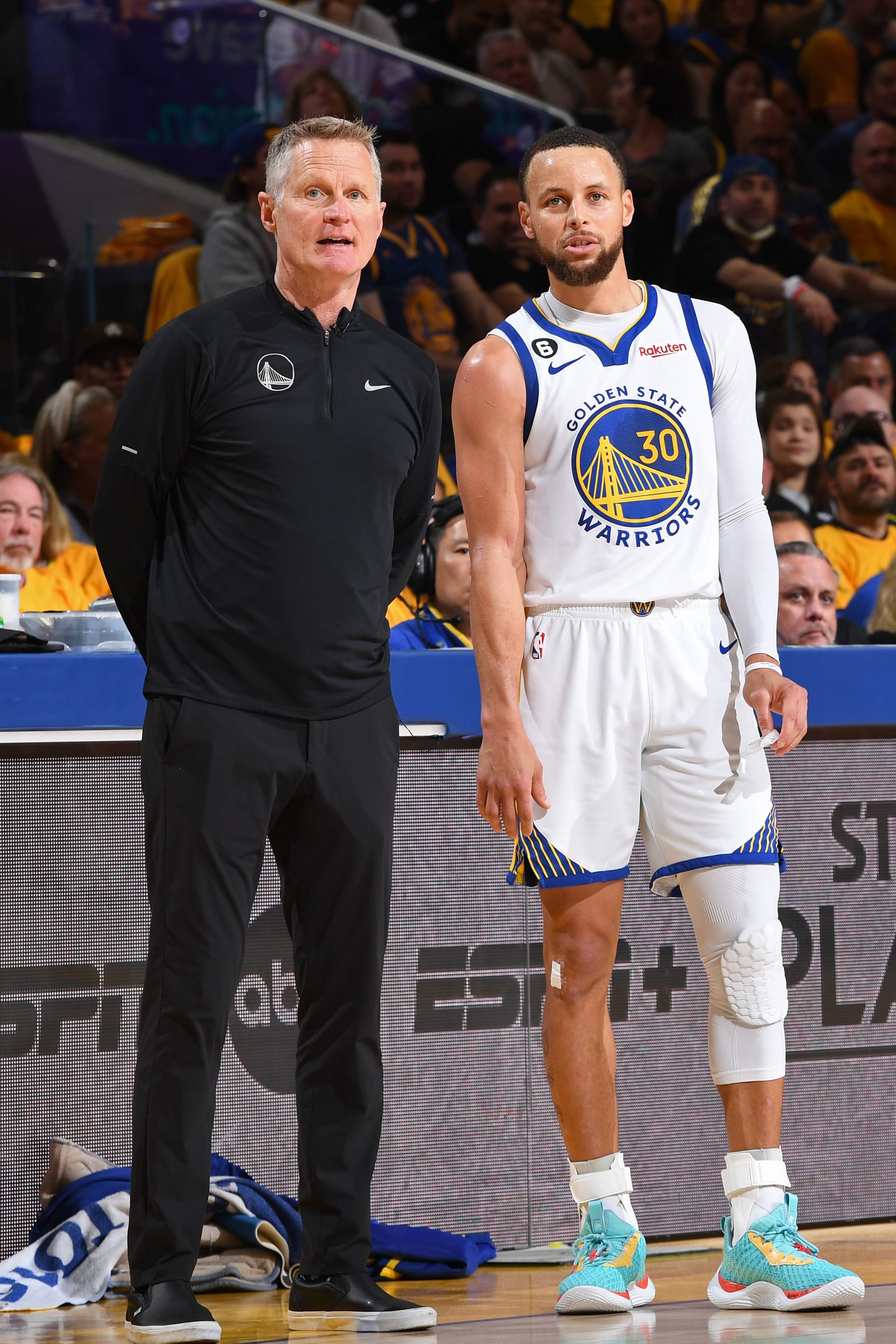 SAN FRANCISCO, CA - APRIL 23: Head Coach Steve Kerr of the Golden State Warriors and Stephen Curry #30 talk during the game against the Sacramento Kings during Round One Game Four of the 2023 NBA Playoffs on April 23, 2023 at Chase Center in San Francisco, California. NOTE TO USER: User expressly acknowledges and agrees that, by downloading and or using this photograph, user is consenting to the terms and conditions of Getty Images License Agreement. Mandatory Copyright Notice: Copyright 2023 NBAE (Photo by Noah Graham/NBAE via Getty Images)