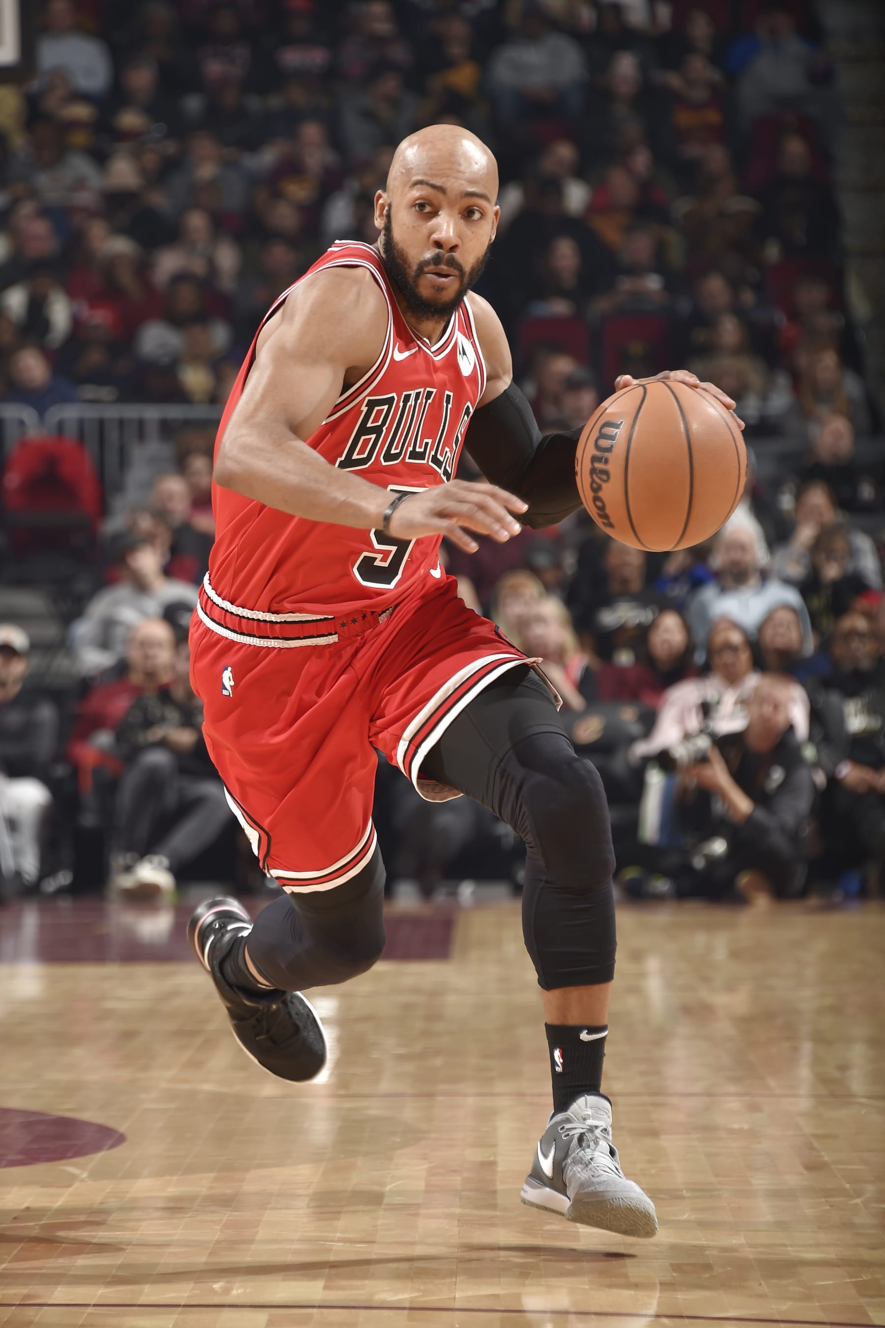 CLEVELAND, OH - JANUARY 15: Jevon Carter #5 of the Chicago Bulls dribbles the ball during the game against the Cleveland Cavaliers on January 15, 2024 at Rocket Mortgage FieldHouse in Cleveland, Ohio. NOTE TO USER: User expressly acknowledges and agrees that, by downloading and/or using this Photograph, user is consenting to the terms and conditions of the Getty Images License Agreement. Mandatory Copyright Notice: Copyright 2024 NBAE (Photo by David Liam Kyle/NBAE via Getty Images)
