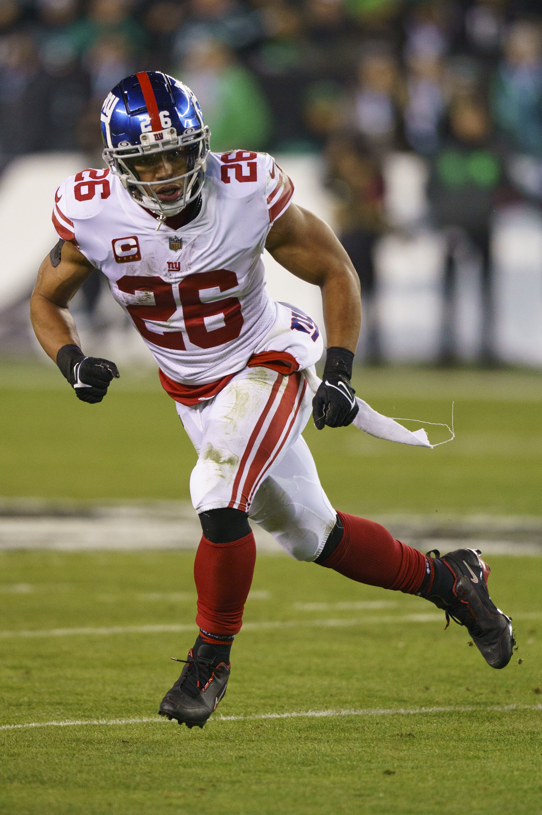 New York Giants running back Saquon Barkley (26) in action during the NFL divisional round playoff football game against the Philadelphia Eagles, Saturday, Jan. 21, 2023, in Philadelphia. (AP Photo/Chris Szagola)