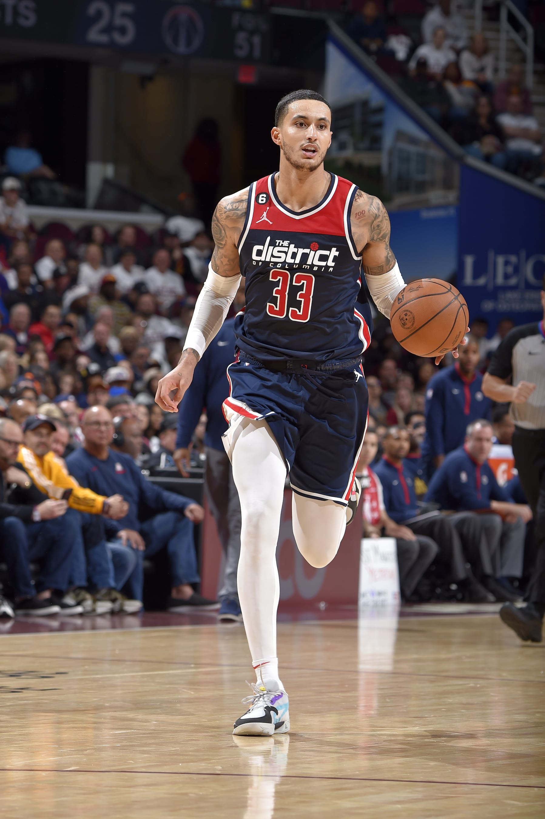 CLEVELAND, OH - OCTOBER 23: Kyle Kuzma #33 of the Washington Wizards dribbles the ball against the Cleveland Cavaliers on October23, 2022 at Rocket Mortgage FieldHouse in Cleveland, Ohio. NOTE TO USER: User expressly acknowledges and agrees that, by downloading and/or using this Photograph, user is consenting to the terms and conditions of the Getty Images License Agreement. Mandatory Copyright Notice: Copyright 2022 NBAE (Photo by David Liam Kyle/NBAE via Getty Images)