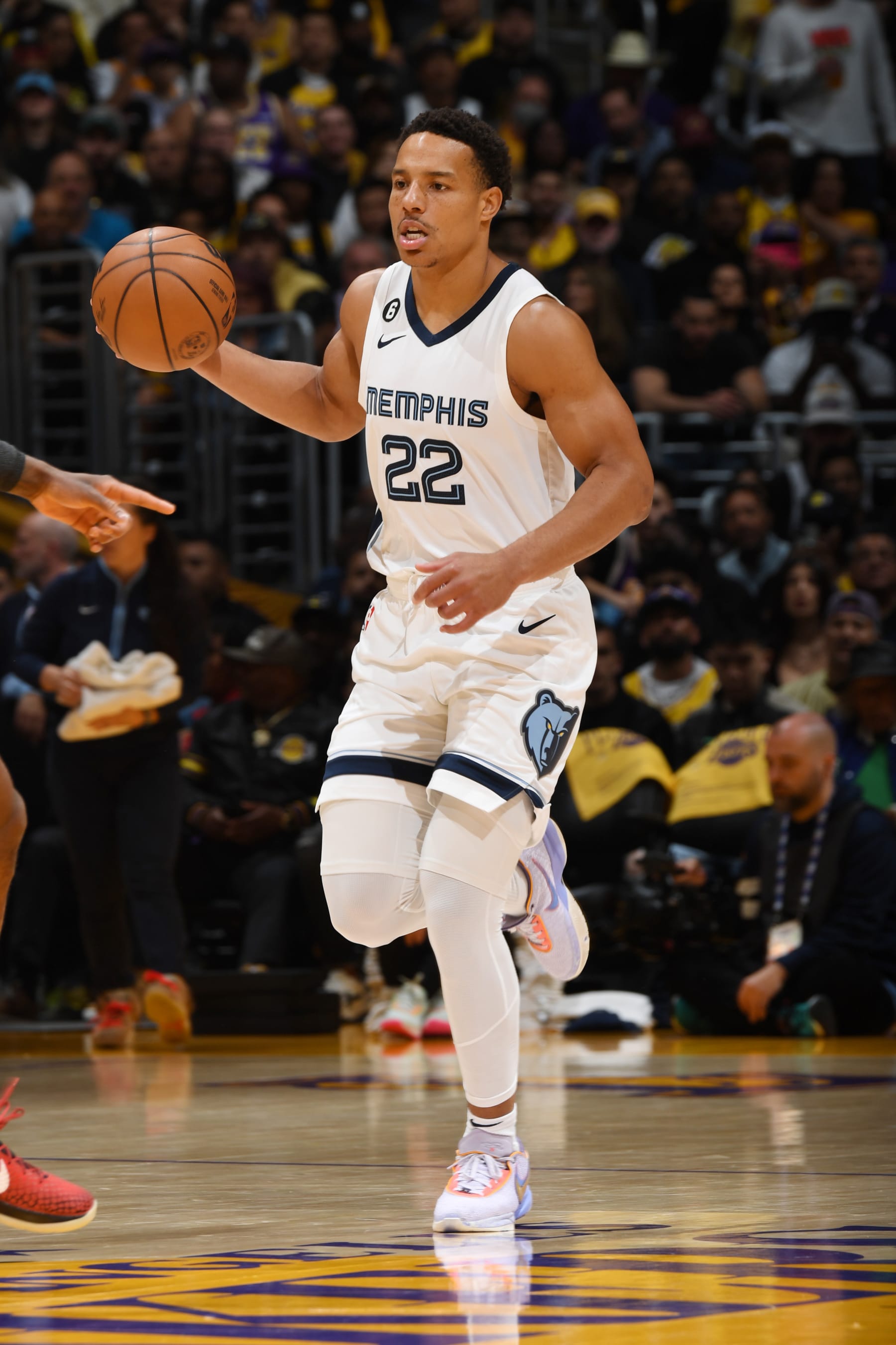 LOS ANGELES, CA - APRIL 24: Desmond Bane #22 of the Memphis Grizzlies dribbles the ball during Round One Game Four of the 2023 NBA Playoffs against the Los Angeles Lakers on April 24, 2023 at Crypto.Com Arena in Los Angeles, California. NOTE TO USER: User expressly acknowledges and agrees that, by downloading and/or using this Photograph, user is consenting to the terms and conditions of the Getty Images License Agreement. Mandatory Copyright Notice: Copyright 2023 NBAE (Photo by Andrew D. Bernstein/NBAE via Getty Images)