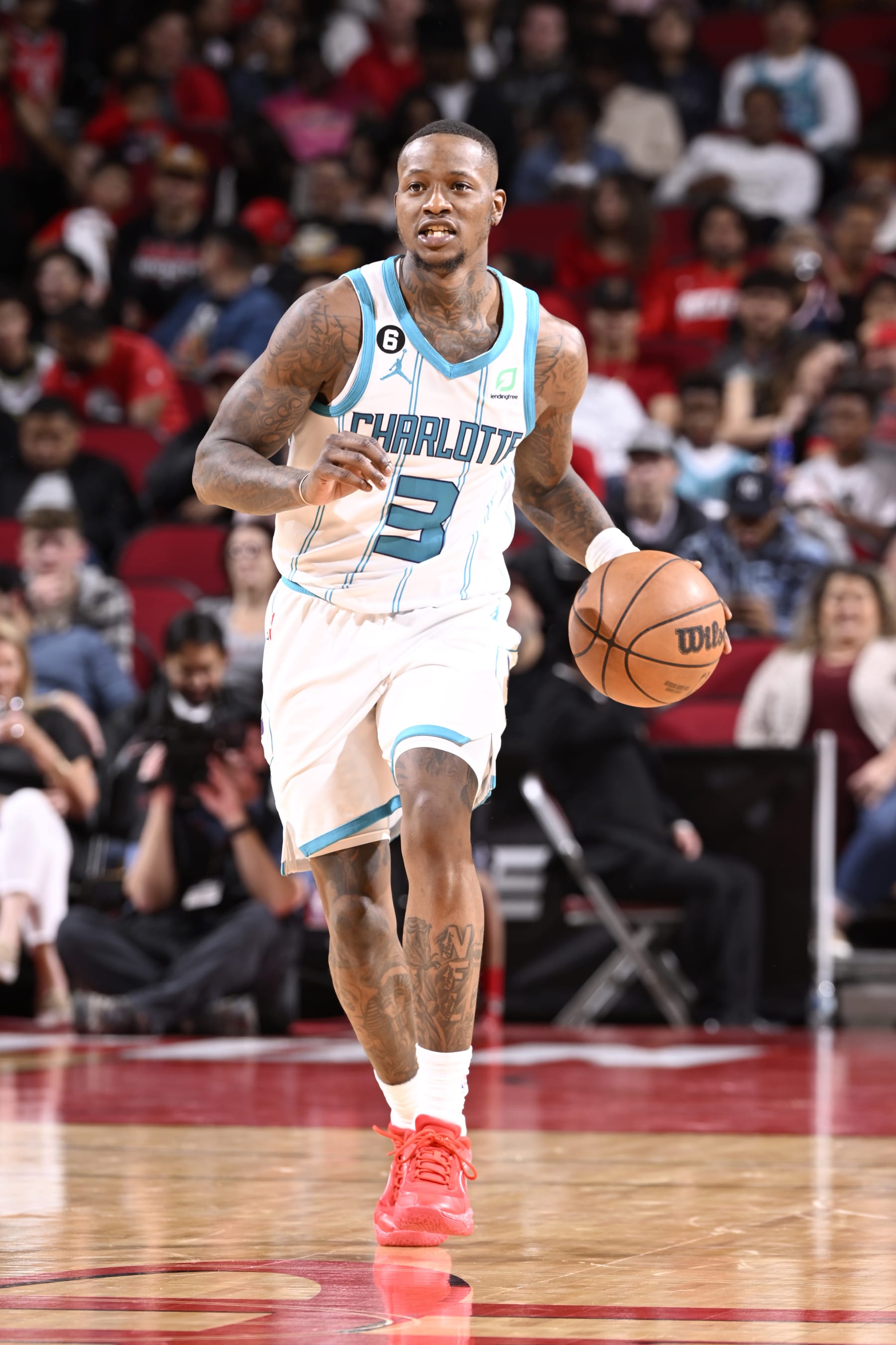 HOUSTON, TX - JANUARY 18:  Terry Rozier #3 of the Charlotte Hornets dribbles the ball against the Houston Rockets on January 18, 2023 at the Toyota Center in Houston, Texas. NOTE TO USER: User expressly acknowledges and agrees that, by downloading and or using this photograph, User is consenting to the terms and conditions of the Getty Images License Agreement. Mandatory Copyright Notice: Copyright 2023 NBAE (Photo by Logan Riely/NBAE via Getty Images)