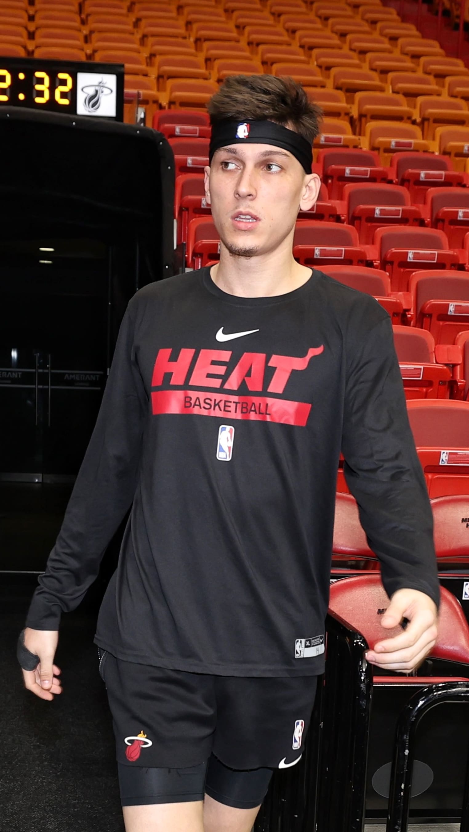 MIAMI, FL - JUNE 8: Tyler Herro #14 of the Miami Heat looks on during 2023 NBA Finals Practice and Media Availability on June 8, 2023 at Kaseya Center in Miami, Florida. NOTE TO USER: User expressly acknowledges and agrees that, by downloading and or using this Photograph, user is consenting to the terms and conditions of the Getty Images License Agreement. Mandatory Copyright Notice: Copyright 2023 NBAE (Photo by Jim Poorten/NBAE via Getty Images)