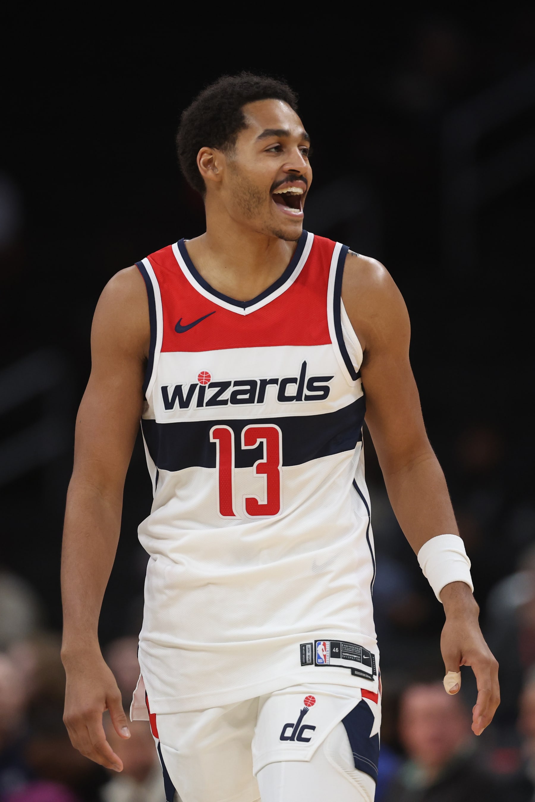 WASHINGTON, DC - OCTOBER 10: Jordan Poole #13 of the Washington Wizards reacts against the Cairns Taipans during the first half of a preseason game at Capital One Arena on October 10, 2023 in Washington, DC. NOTE TO USER: User expressly acknowledges and agrees that, by downloading and or using this photograph, User is consenting to the terms and conditions of the Getty Images License Agreement.  (Photo by Patrick Smith/Getty Images)