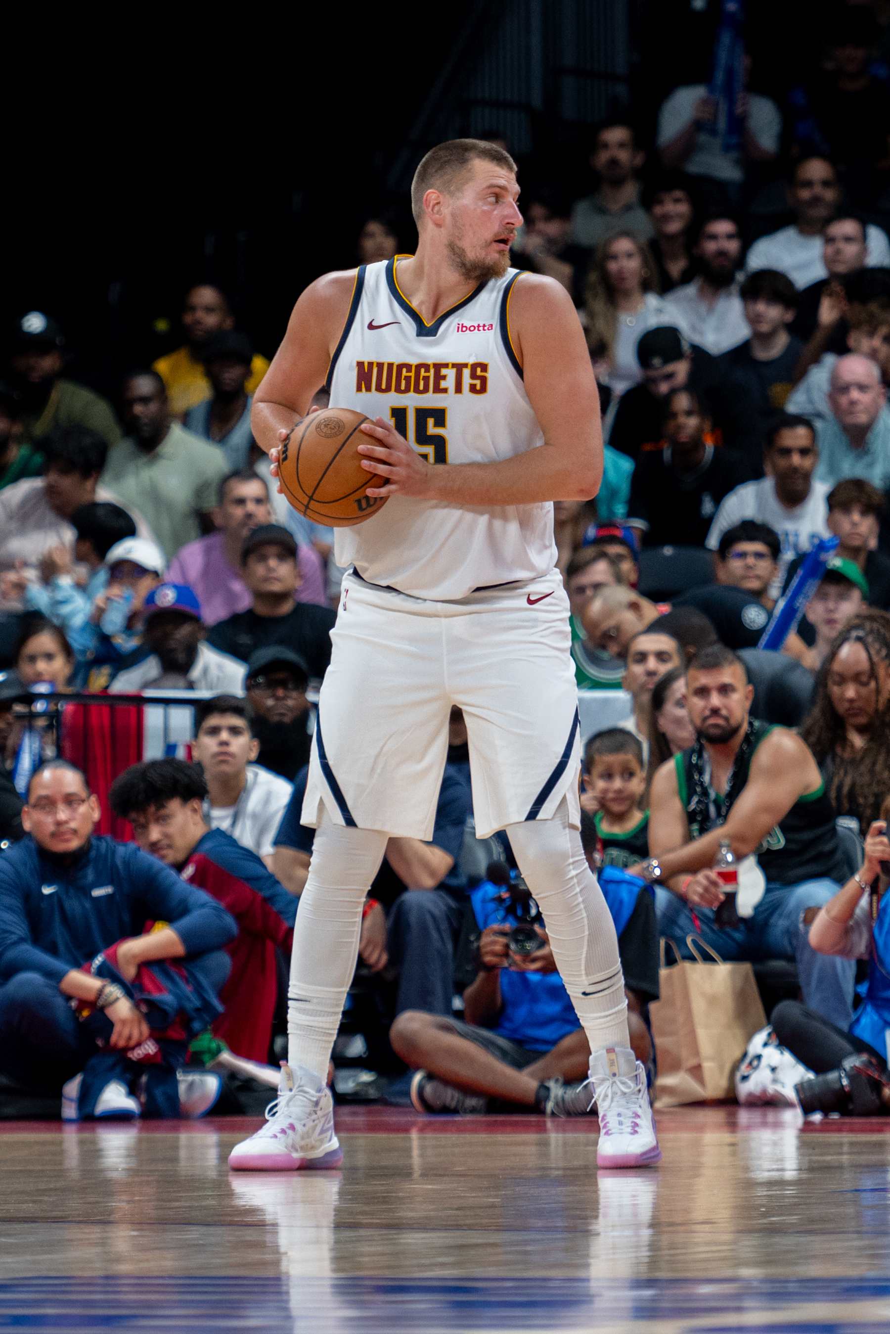 ABU DHABI, UNITED ARAB EMIRATES - OCTOBER 04: Nikola Jokic (15) of Denver Nuggets in action during the NBA Preseason game between the Denver Nuggets and the Boston Celtics at the Etihad Arena in Abu Dhabi on October 04, 2024. (Photo by Waleed Zein/Anadolu via Getty Images)