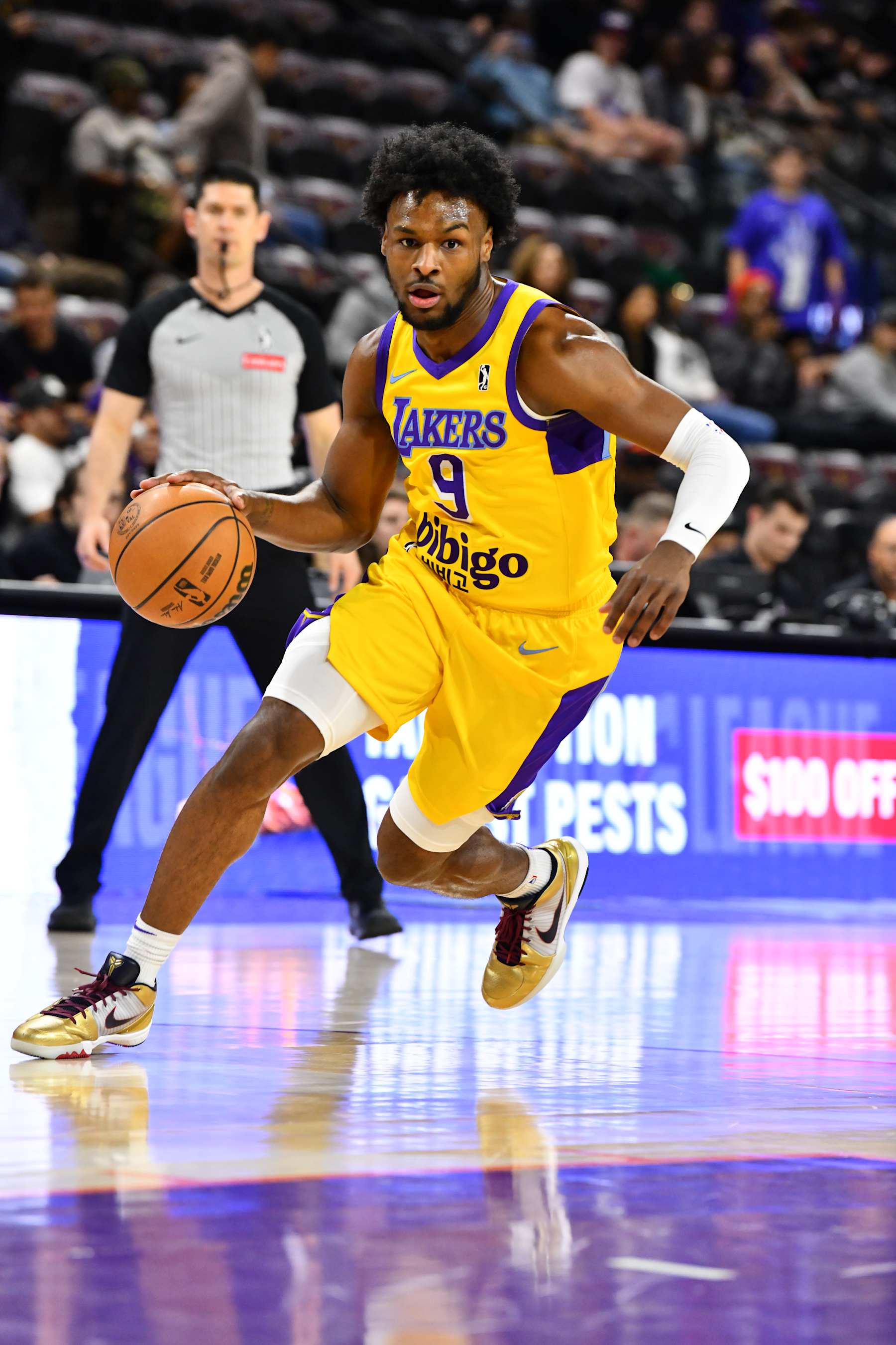 TEMPE, AZ - Bronny James #9 of the South Bay Lakers dribbles the ball  during the game against the Valley Suns on December 12, 2024, at Mullett Arena in Tempe, Arizona. NOTE TO USER: User expressly acknowledges and agrees that, by downloading and or using this photograph, user is consenting to the terms and conditions of the Getty Images License Agreement. Mandatory Copyright Notice: Copyright 2024 NBAE (Photo by Barry Gossage / NBAE via Getty Images)