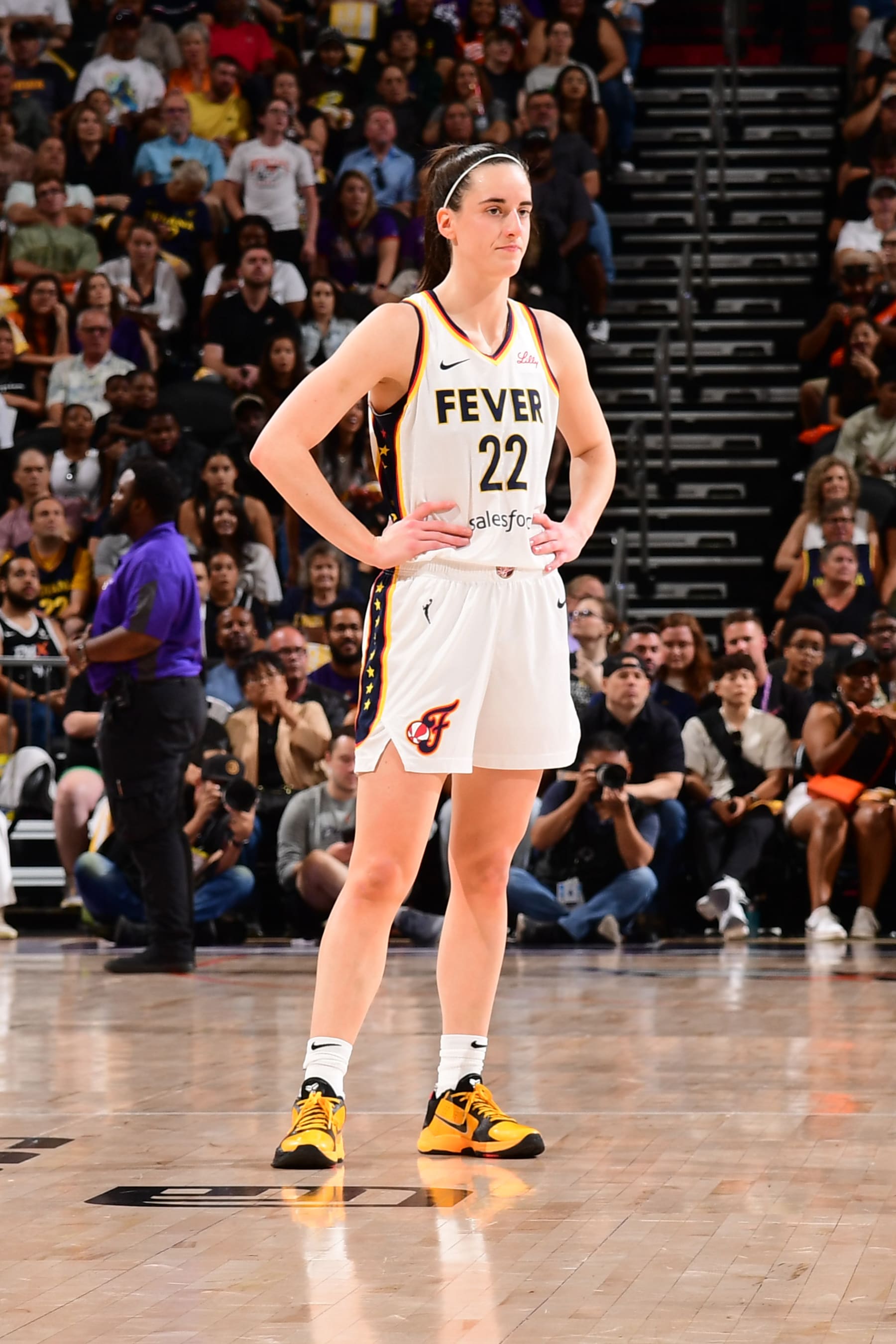 PHOENIX, AZ - JUNE 30: Caitlin Clark #22 of the Indiana Fever looks on during the game against the Phoenix Mercury on June 30, 2024 at Footprint Center in Phoenix, Arizona. NOTE TO USER: User expressly acknowledges and agrees that, by downloading and or using this photograph, user is consenting to the terms and conditions of the Getty Images License Agreement. Mandatory Copyright Notice: Copyright 2024 NBAE (Photo by Kate Frese/NBAE via Getty Images)