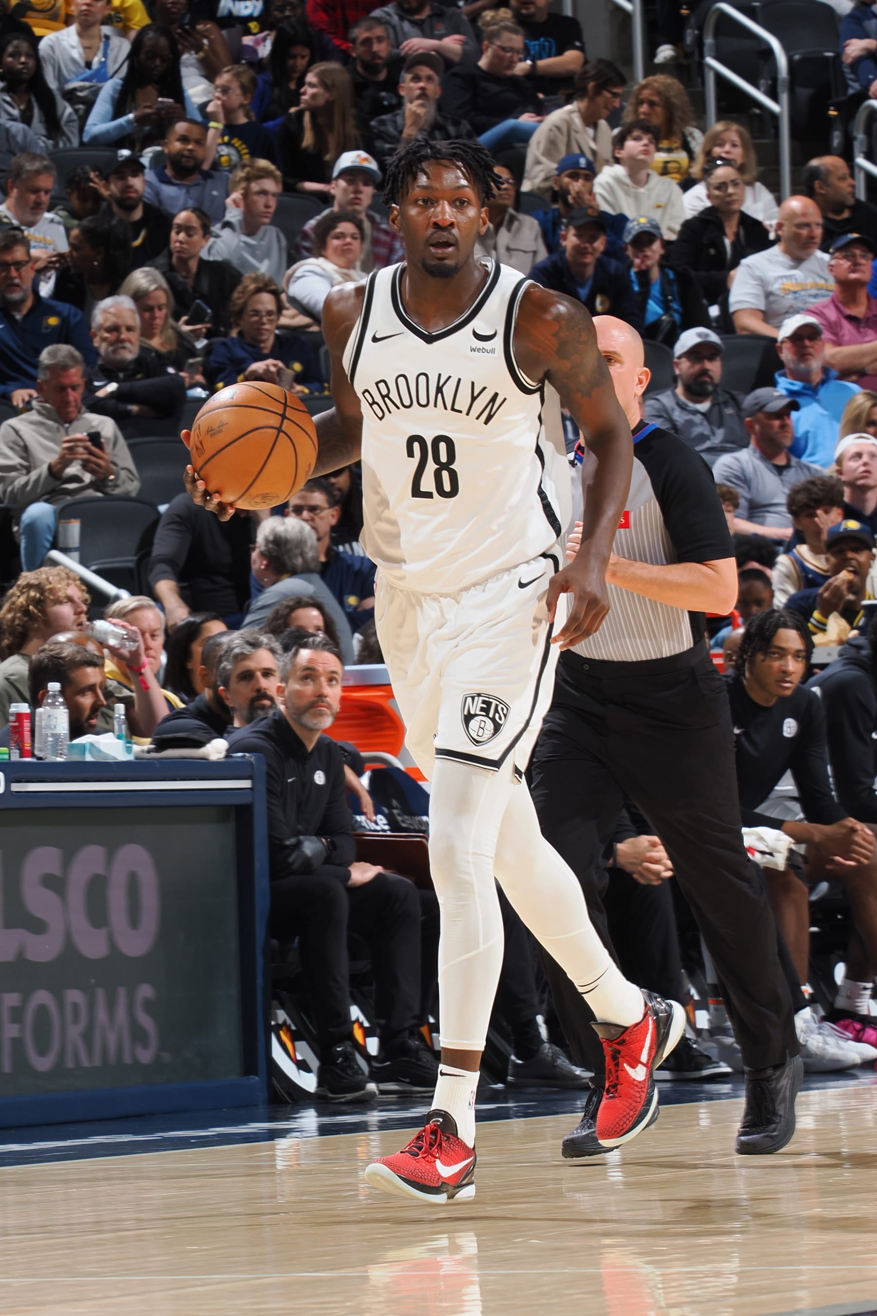 INDIANAPOLIS, IN - APRIL 1: Dorian Finney-Smith #28 of the Brooklyn Nets looks on during the game against the Indiana Pacers on April 1, 2024 at Gainbridge Fieldhouse in Indianapolis, Indiana. NOTE TO USER: User expressly acknowledges and agrees that, by downloading and or using this Photograph, user is consenting to the terms and conditions of the Getty Images License Agreement. Mandatory Copyright Notice: Copyright 2024 NBAE (Photo by Ron Hoskins/NBAE via Getty Images)