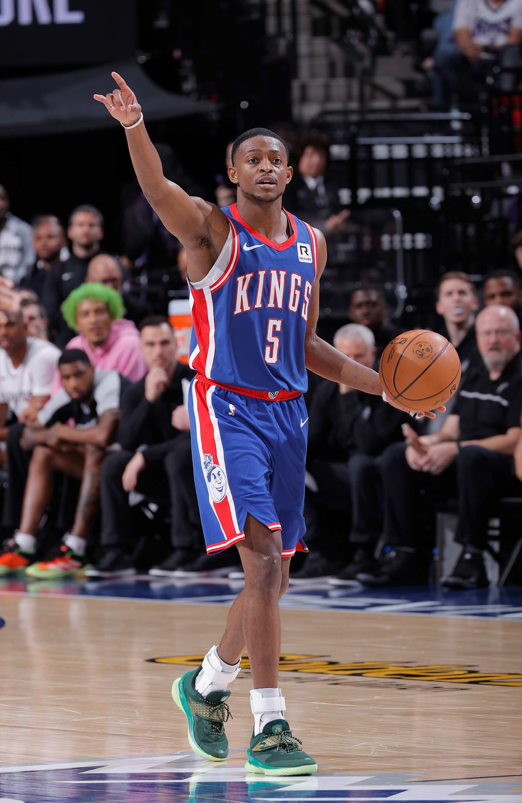 SACRAMENTO, CA - DECEMBER 1: De'Aaron Fox #5 of the Sacramento Kings calls a play while bringing the ball up the court during the game against the San Antonio Spurs on December 1, 2024 at Golden 1 Center in Sacramento, California. NOTE TO USER: User expressly acknowledges and agrees that, by downloading and or using this photograph, User is consenting to the terms and conditions of the Getty Images Agreement. Mandatory Copyright Notice: Copyright 2024 NBAE (Photo by Rocky Widner/NBAE via Getty Images)
