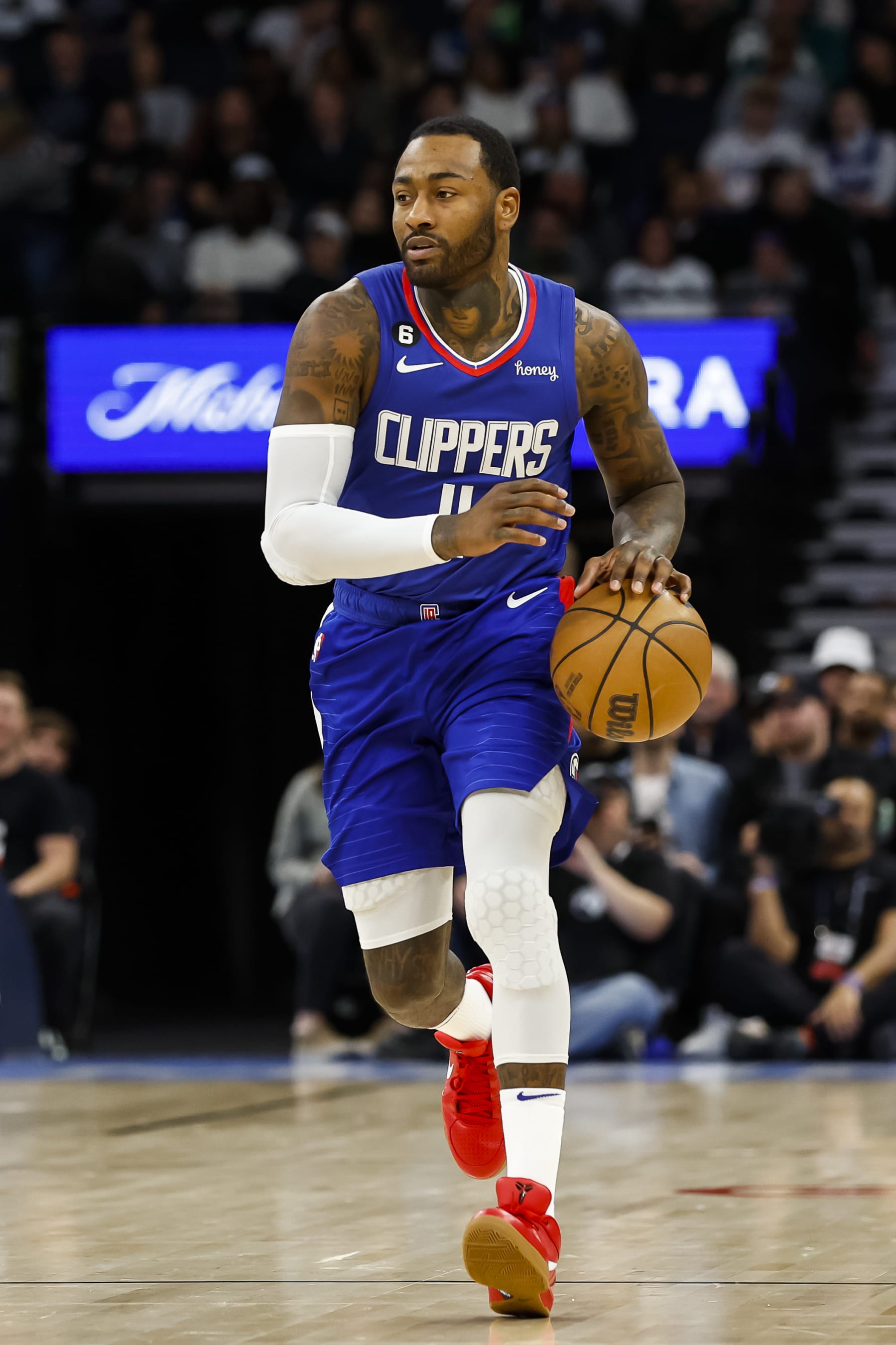 MINNEAPOLIS, MN - JANUARY 06: John Wall #11 of the LA Clippers dribbles the ball against the Minnesota Timberwolves in the third quarter of the game at Target Center on January 6, 2023 in Minneapolis, Minnesota. The Timberwolves defeated the Clippers 128-115. NOTE TO USER: User expressly acknowledges and agrees that, by downloading and or using this Photograph, user is consenting to the terms and conditions of the Getty Images License Agreement. (Photo by David Berding/Getty Images)