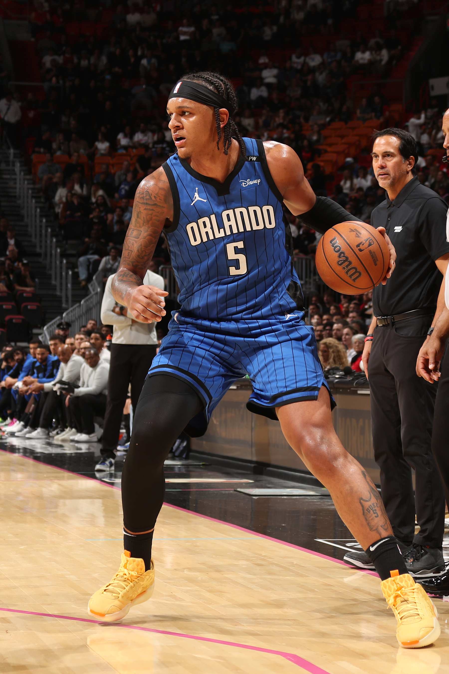 MIAMI, FL - JANUARY 27: Paolo Banchero #5 of the Orlando Magic handles the ball during the game against the Miami Heat on January 27, 2025 at Kaseya Center in Miami, Florida. NOTE TO USER: User expressly acknowledges and agrees that, by downloading and or using this Photograph, user is consenting to the terms and conditions of the Getty Images License Agreement. Mandatory Copyright Notice: Copyright 2025 NBAE (Photo by Issac Baldizon/NBAE via Getty Images)