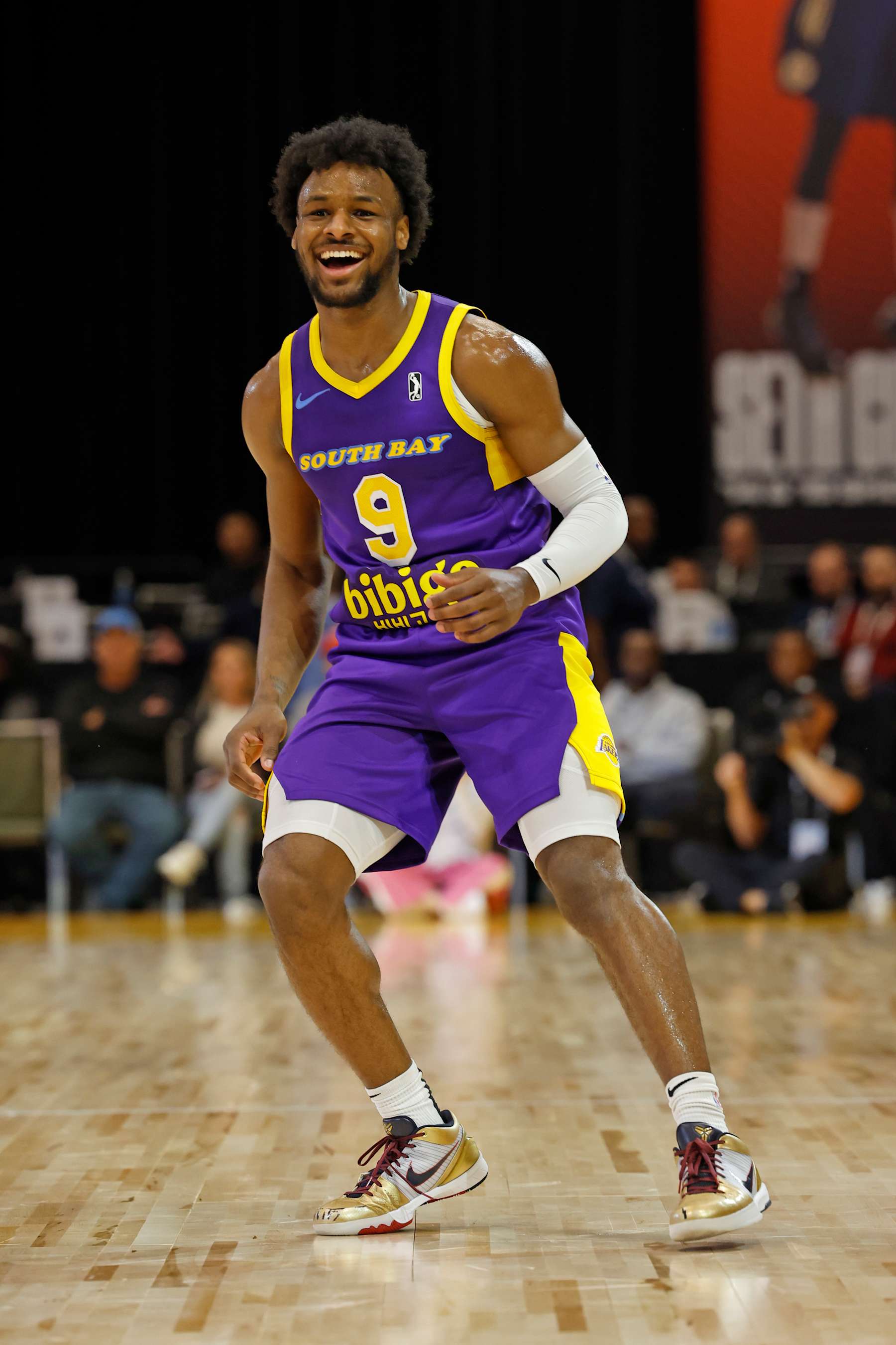 ORLANDO, FL - DECEMBER 19: Bronny James #9 of the South Bay Lakers smiles against the Greensboro Swarm during an NBA G-League winter showcase game on December 19, 2024 at Orange County Convention Center in Orlando, Florida. NOTE TO USER: User expressly acknowledges and agrees that, by downloading and or using this photograph, User is consenting to the terms and conditions of the Getty Images License Agreement. Mandatory Copyright Notice: Copyright 2024 NBAE (Photo by Scott Audette/NBAE via Getty Images)