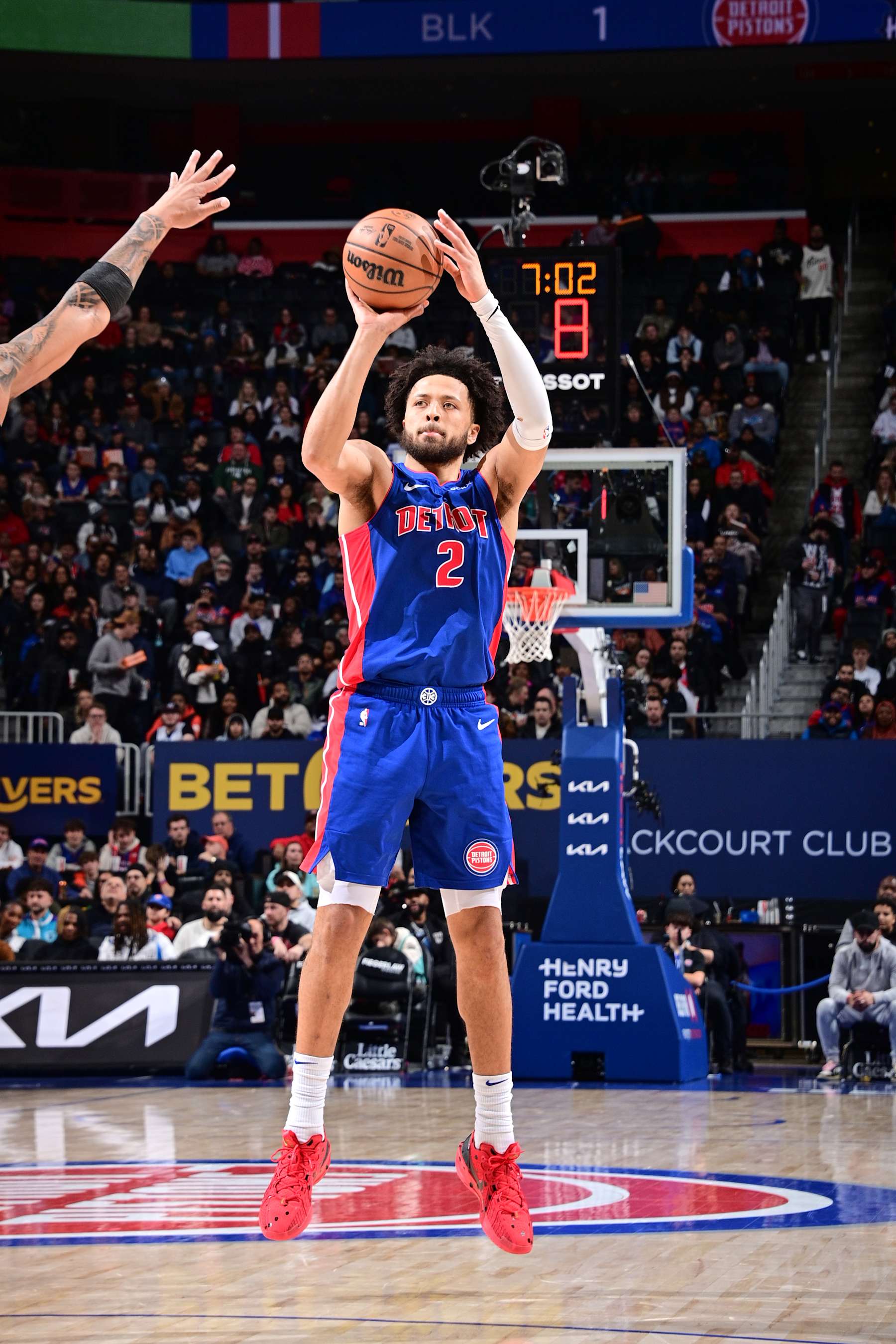 DETROIT, MI - JANUARY 3: Cade Cunningham #2 of the Detroit Pistons shoots a three point basket during the game against the Charlotte Hornets on January 3, 2025 at Little Caesars Arena in Detroit, Michigan. NOTE TO USER: User expressly acknowledges and agrees that, by downloading and/or using this photograph, User is consenting to the terms and conditions of the Getty Images License Agreement. Mandatory Copyright Notice: Copyright 2025 NBAE (Photo by Chris Schwegler/NBAE via Getty Images)