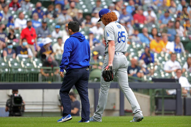 MILWAUKEE, WISCONSIN - MAY 01: Dustin May #85 of the Los Angeles Dodgers leaves the game in the second inning against the Milwaukee Brewers at American Family Field on May 01, 2021 in Milwaukee, Wisconsin. (Photo by Stacy Revere/Getty Images)