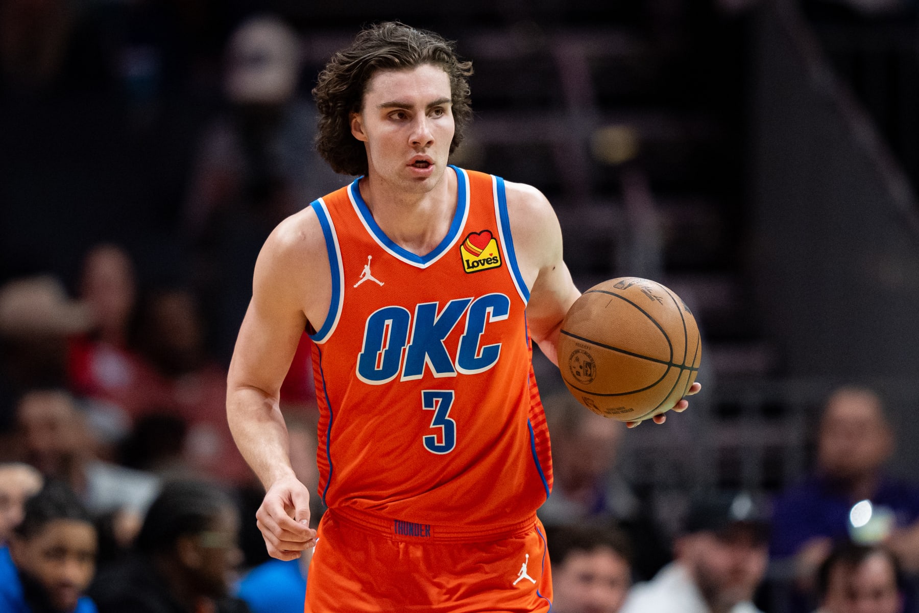 CHARLOTTE, NORTH CAROLINA - APRIL 07: Josh Giddey #3 of the Oklahoma City Thunder brings the ball up court against the Charlotte Hornets during their game at Spectrum Center on April 07, 2024 in Charlotte, North Carolina. NOTE TO USER: User expressly acknowledges and agrees that, by downloading and or using this photograph, User is consenting to the terms and conditions of the Getty Images License Agreement. (Photo by Jacob Kupferman/Getty Images)