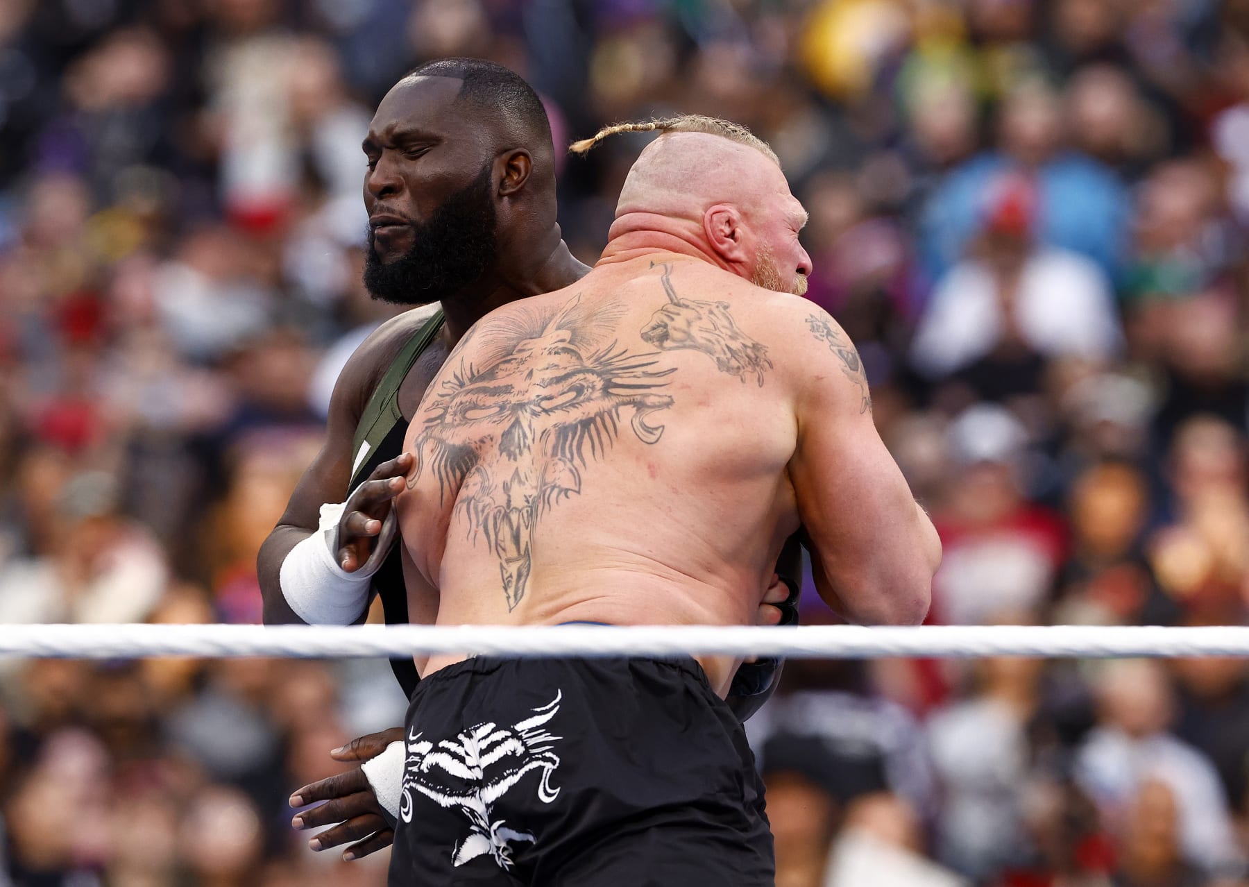 INGLEWOOD, CALIFORNIA - APRIL 02:  ((L-R) Omos wrestles Brock Lesnar during WrestleMania Goes Hollywood at SoFi Stadium on April 02, 2023 in Inglewood, California.  (Photo by Ronald Martinez/Getty Images)