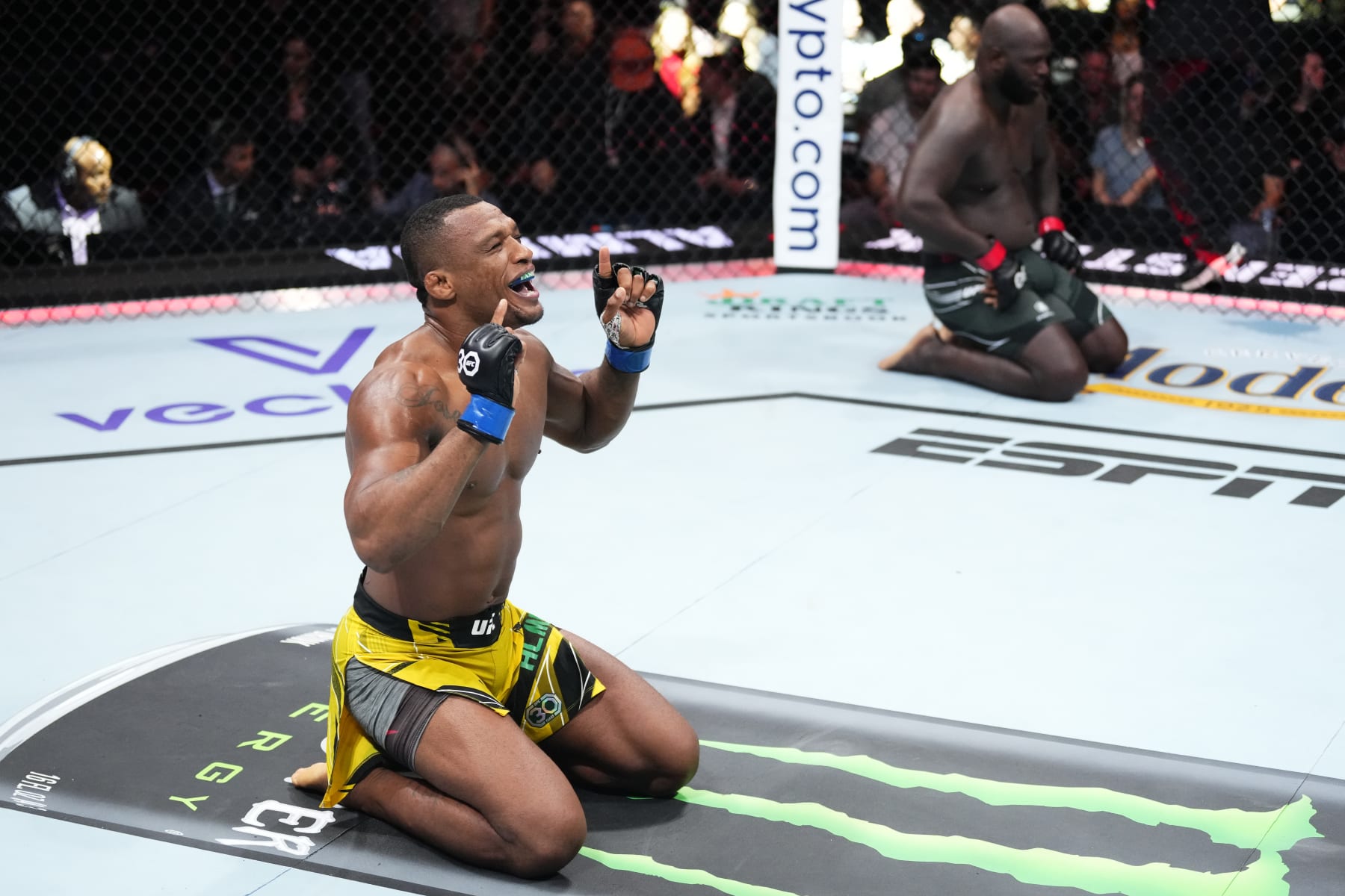 CHARLOTTE, NORTH CAROLINA - MAY 13:  (L-R) Jailton Almeida of Brazil celebrates his submission victory over Jairzinho Rozenstruik of Suriname in their heavyweight fight during the UFC Fight Night event at Spectrum Center on May 13, 2023 in Charlotte, North Carolina. (Photo by Jeff Bottari/Zuffa LLC via Getty Images)