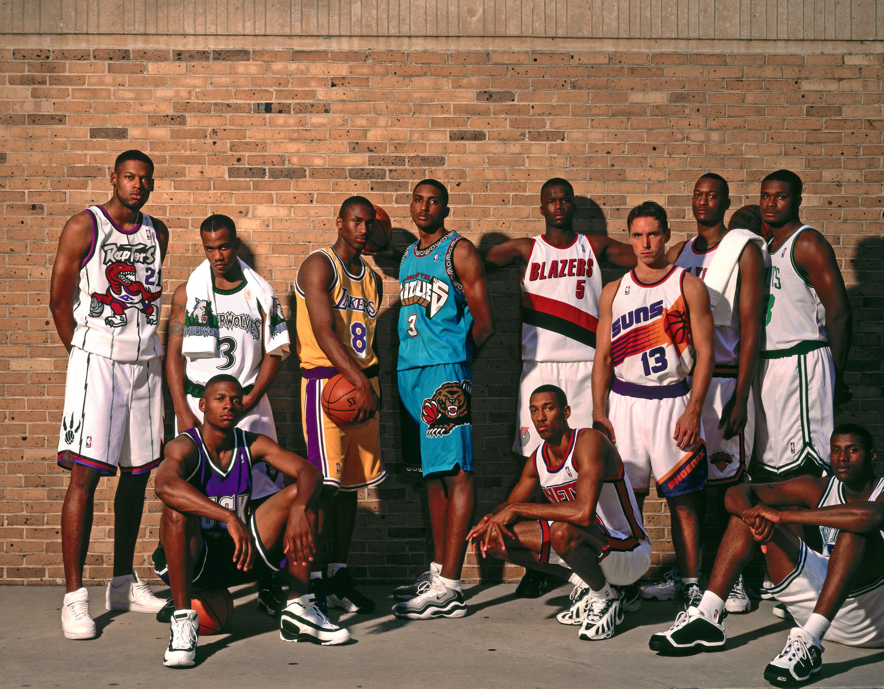 ORLANDO, FL -SEPTEMBER 20:  (L to R) Marcus Camby, Ray Allen, Stephon Marbury, Kobe Bryant, Shareef Abdur-Rahim, Jermaine O'Neal, Kerry Kittles, Steve Nash, John Wallace, Antoine Walker, and Samaki Walker poses for a portrait during the 1996 NBA Rookie Photo Shoot on September 20, 1996 in Orlando, Florida. NOTE TO USER: User expressly acknowledges and agrees that, by downloading and or using this photograph, User is consenting to the terms and conditions of the Getty Images License Agreement. Mandatory Copyright Notice: Copyright 1996 NBAE (Photo by Nathaniel S. Butler/NBAE via Getty Images)