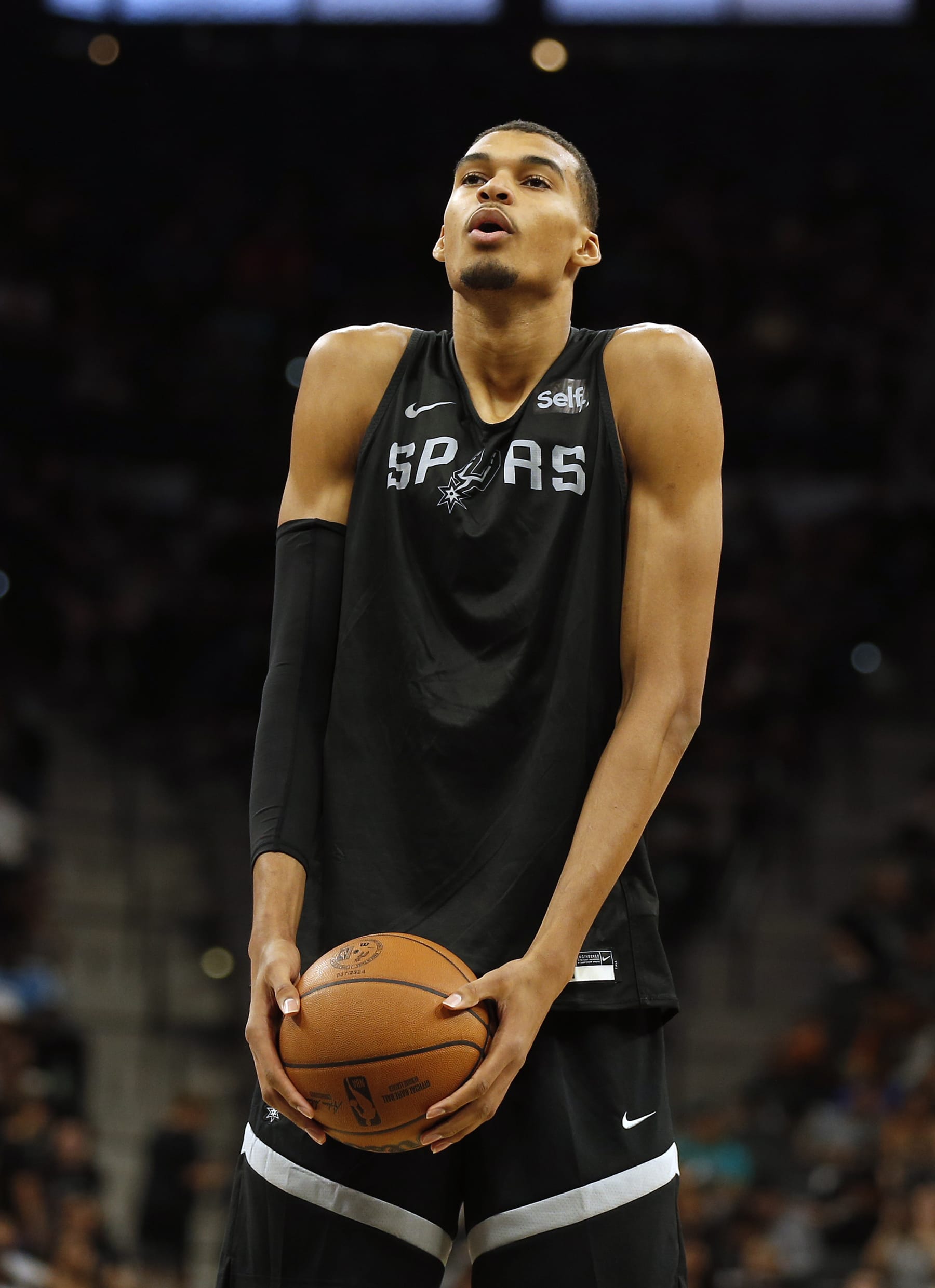 SAN ANTONIO, TX - OCTOBER 7: Victor Wembanyama #1 of the San Antonio Spurs prepares to shoot a free throw during the San Antonio Spurs Silver and Black Scrimmage at Frost Bank Center on October 7, 2023 in San Antonio, Texas. NOTE TO USER: User expressly acknowledges and agrees that, by downloading and or using this photograph, User is consenting to terms and conditions of the Getty Images License Agreement. (Photo by Ronald Cortes/Getty Images)