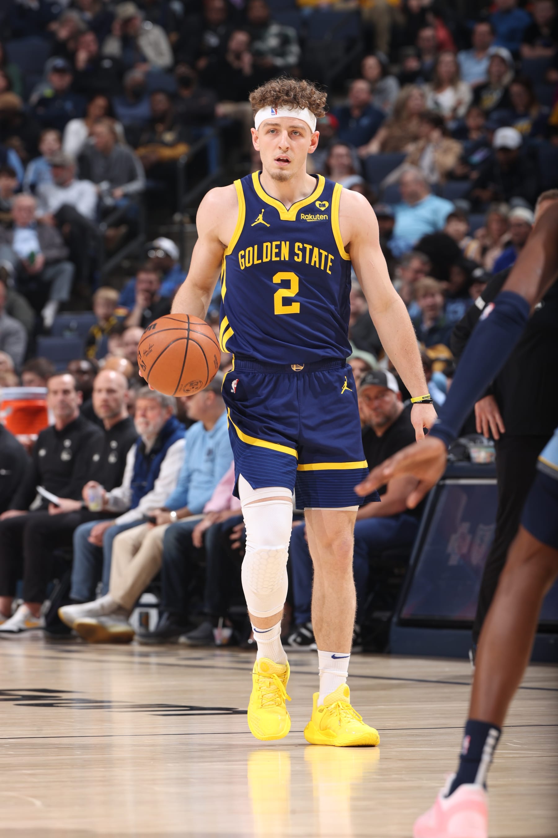MEMPHIS, TN - FEBRUARY 2: Brandin Podziemski #2 of the Golden State Warriors dribbles the ball during the game against the Memphis Grizzlies on February 2, 2024 at FedExForum in Memphis, Tennessee. NOTE TO USER: User expressly acknowledges and agrees that, by downloading and or using this photograph, User is consenting to the terms and conditions of the Getty Images License Agreement. Mandatory Copyright Notice: Copyright 2024 NBAE (Photo by Joe Murphy/NBAE via Getty Images)