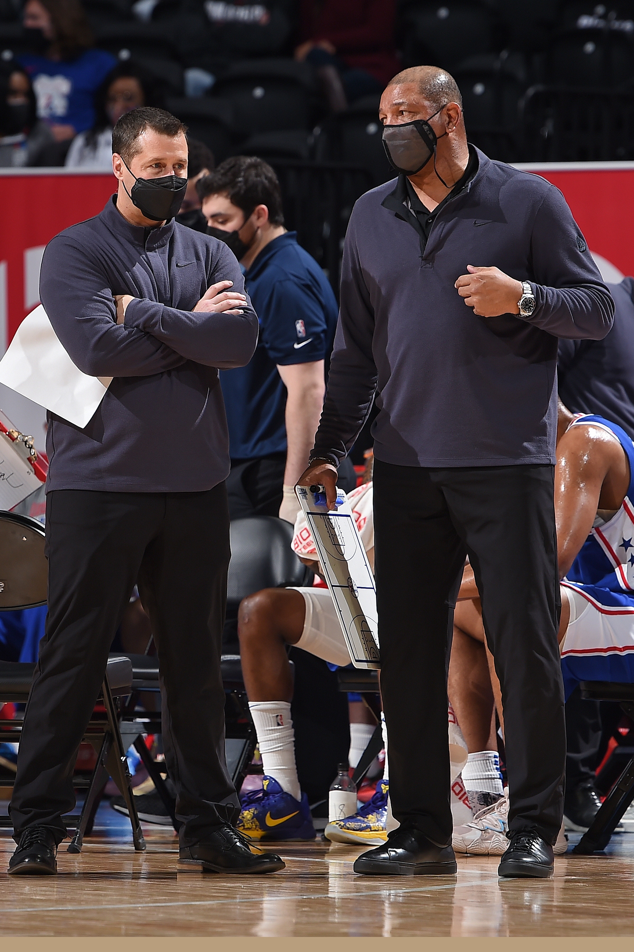 PHILADELPHIA, PA - MARCH 20: Head Coach Doc Rivers and Assistant Coach Dave Joerger of the Philadelphia 76ers talk during the game against the Sacramento Kings on March 20, 2021 at the Wells Fargo Center in Philadelphia, Pennsylvania NOTE TO USER: User expressly acknowledges and agrees that, by downloading and/or using this Photograph, user is consenting to the terms and conditions of the Getty Images License Agreement. Mandatory Copyright Notice: Copyright 2021 NBAE (Photo by David Dow/NBAE via Getty Images)