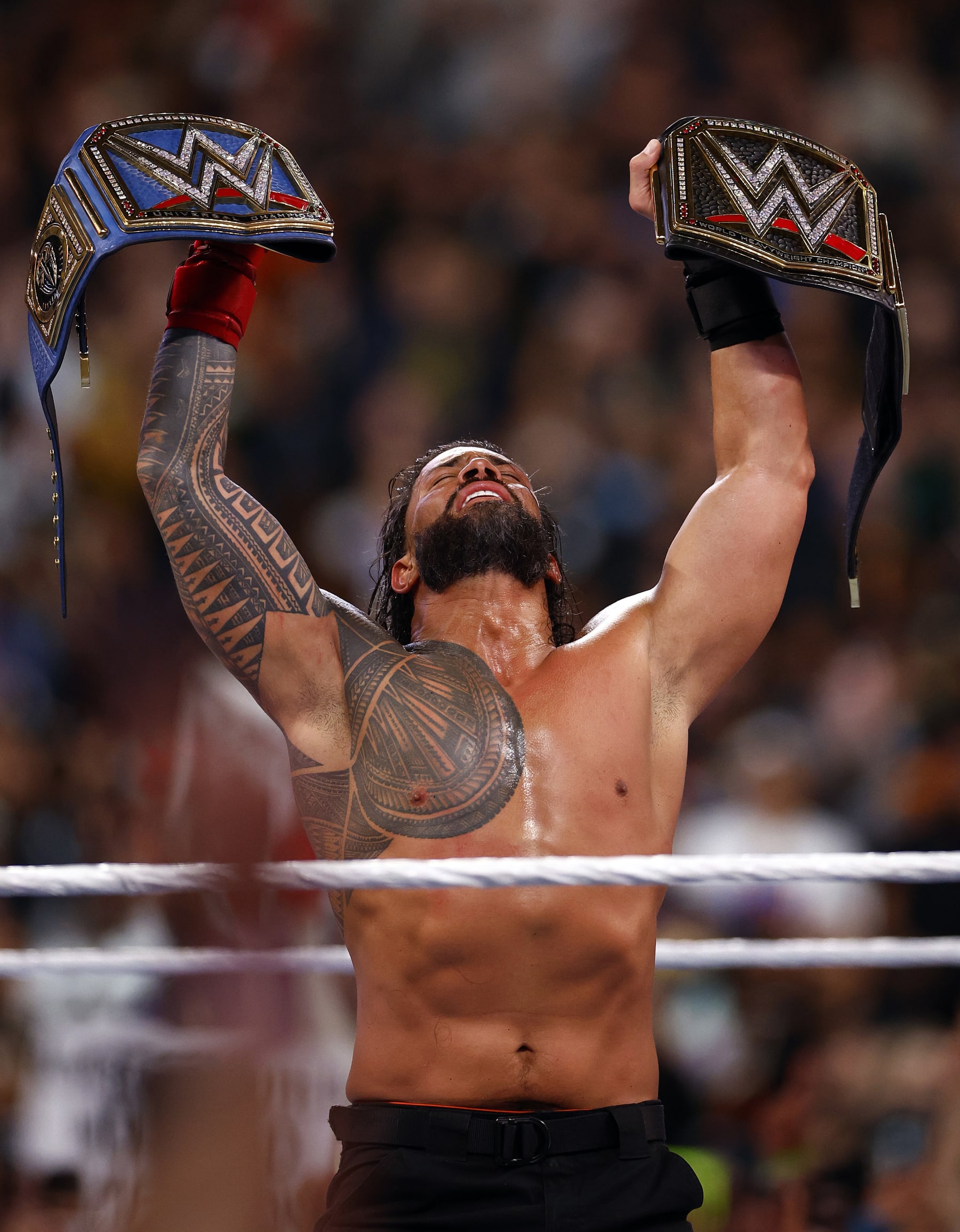 INGLEWOOD, CALIFORNIA - APRIL 02:  (L-R)  Roman Reigns after defeating Cody Rhodes for Undisputed WWE Universal Title Match during WrestleMania Goes Hollywood at SoFi Stadium on April 02, 2023 in Inglewood, California.
 (Photo by Ronald Martinez/Getty Images)