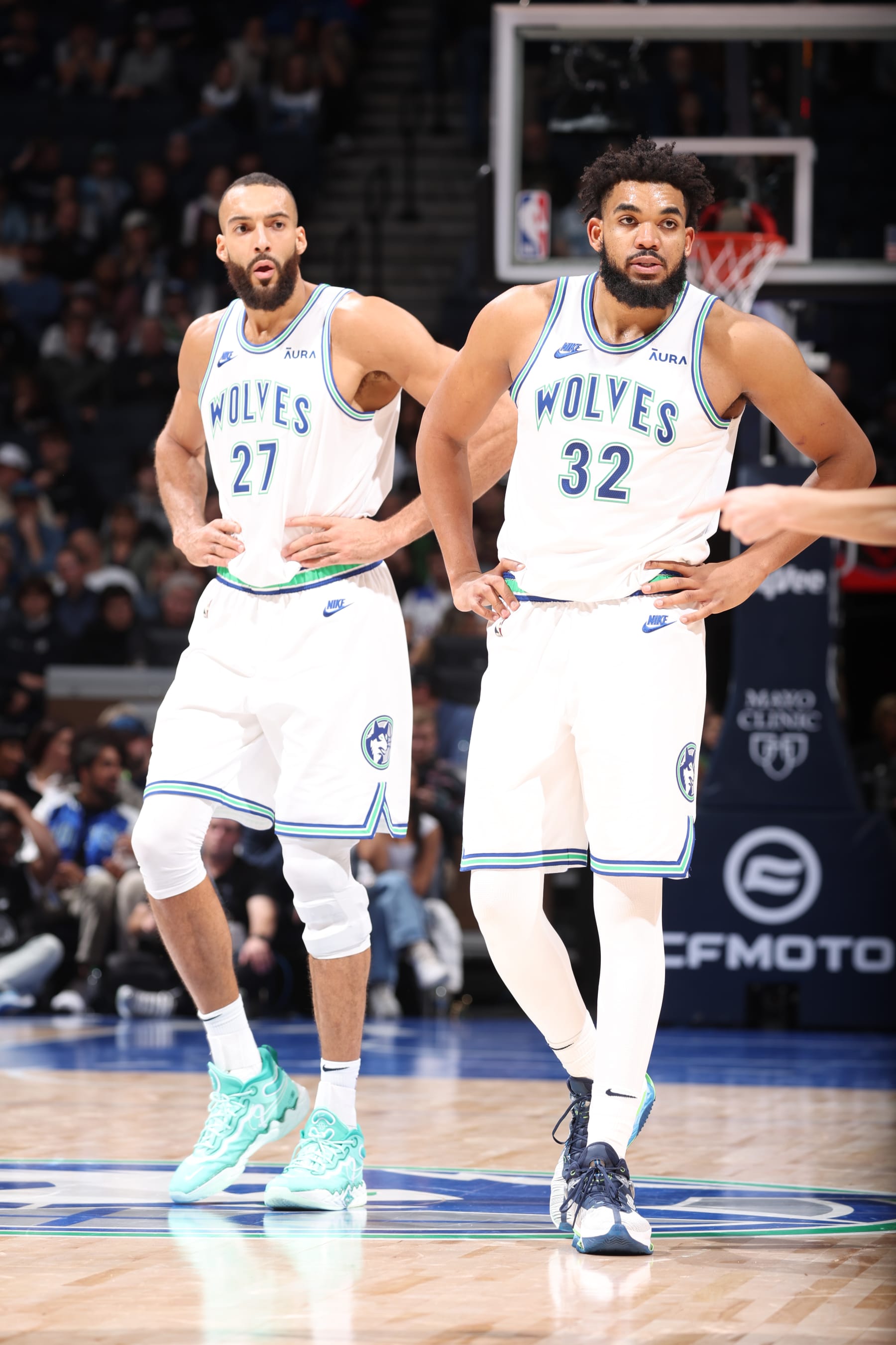 MINNEAPOLIS, MN -  JANUARY 3: Rudy Gobert #27 and Karl-Anthony Towns #32 of the Minnesota Timberwolves look on during the game against the New Orleans Pelicans on January 3, 2024 at Target Center in Minneapolis, Minnesota. NOTE TO USER: User expressly acknowledges and agrees that, by downloading and or using this Photograph, user is consenting to the terms and conditions of the Getty Images License Agreement. Mandatory Copyright Notice: Copyright 2024 NBAE (Photo by David Sherman/NBAE via Getty Images)