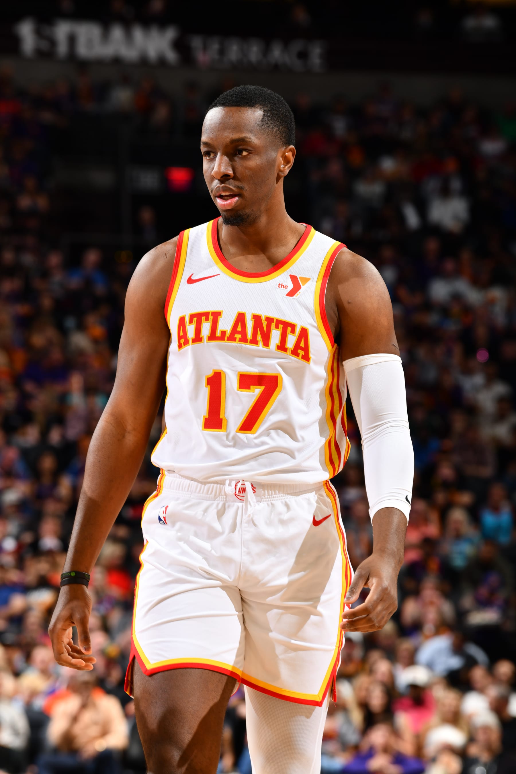 PHOENIX, AZ - MARCH 21:  Onyeka Okongwu #17 of the Atlanta Hawks looks on during the game on March 21, 2024 at Footprint Center in Phoenix, Arizona. NOTE TO USER: User expressly acknowledges and agrees that, by downloading and or using this photograph, user is consenting to the terms and conditions of the Getty Images License Agreement. Mandatory Copyright Notice: Copyright 2024 NBAE (Photo by Barry Gossage/NBAE via Getty Images)