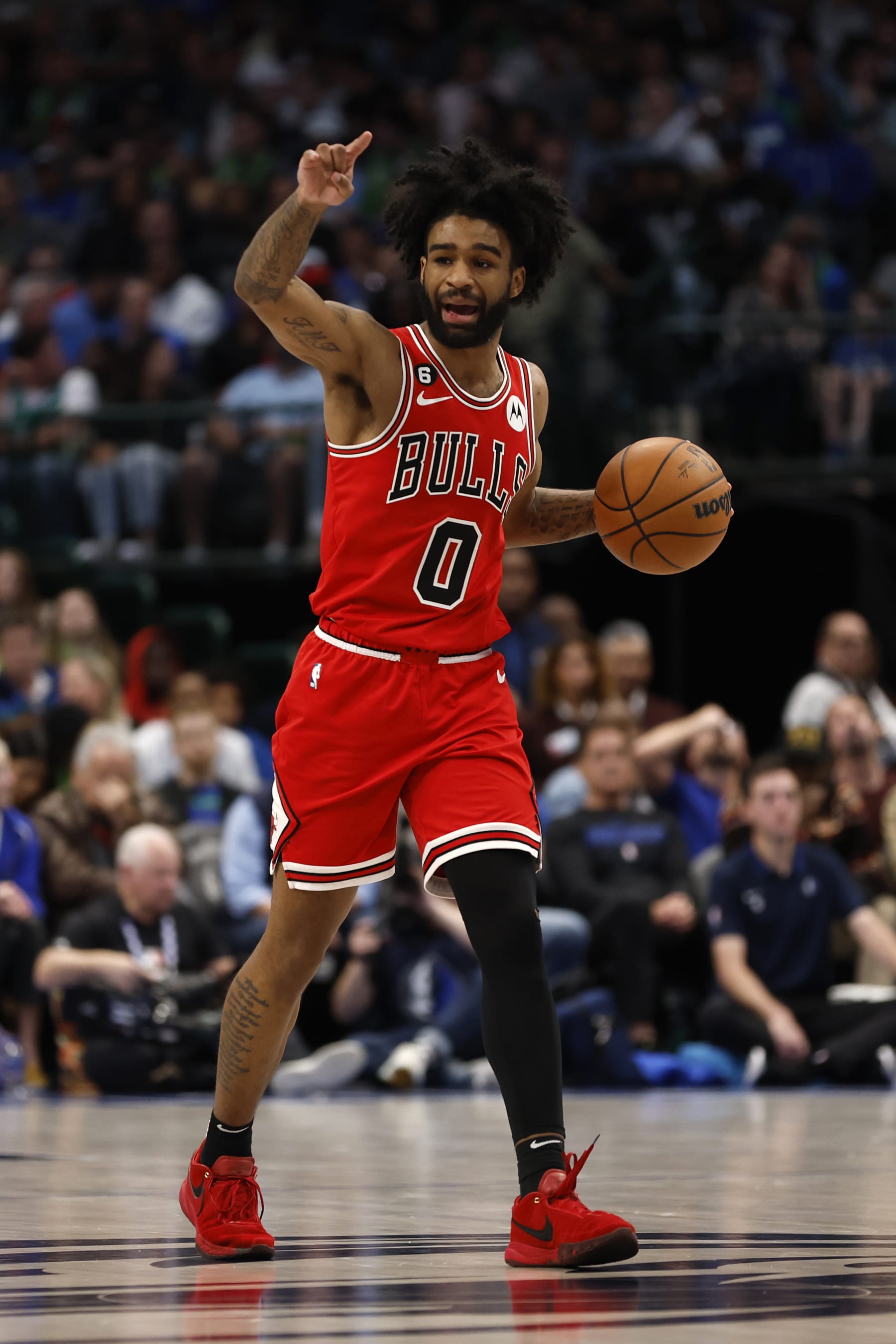 DALLAS, TEXAS - APRIL 07: Coby White #0 of the Chicago Bulls calls a play in the game against the Dallas Mavericks at American Airlines Center on April 07, 2023 in Dallas, Texas. NOTE TO USER: User expressly acknowledges and agrees that, by downloading and or using this photograph, User is consenting to the terms and conditions of the Getty Images License Agreement. (Photo by Tim Heitman/Getty Images)