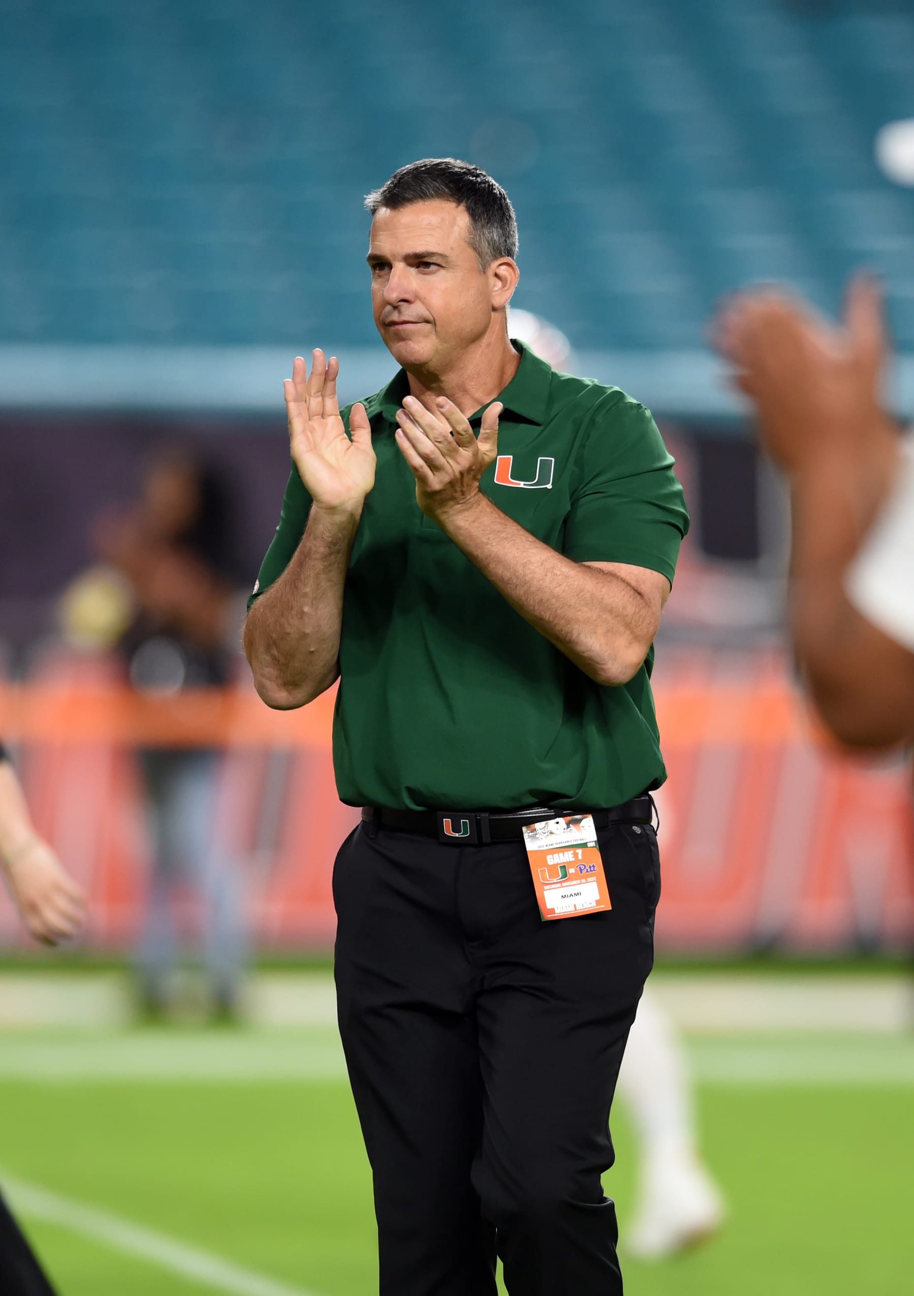 MIAMI GARDENS, FL - NOVEMBER 26: Miami Hurricanes head coaches Mario Cristobal watches warm ups prior to start of college football game between the Pitt Panthers and the Miami Hurricanes on November 26, 2022, at the Hard Rock Stadium in Miami Gardens, FL. (Photo by John Rivera/Icon Sportswire via Getty Images)