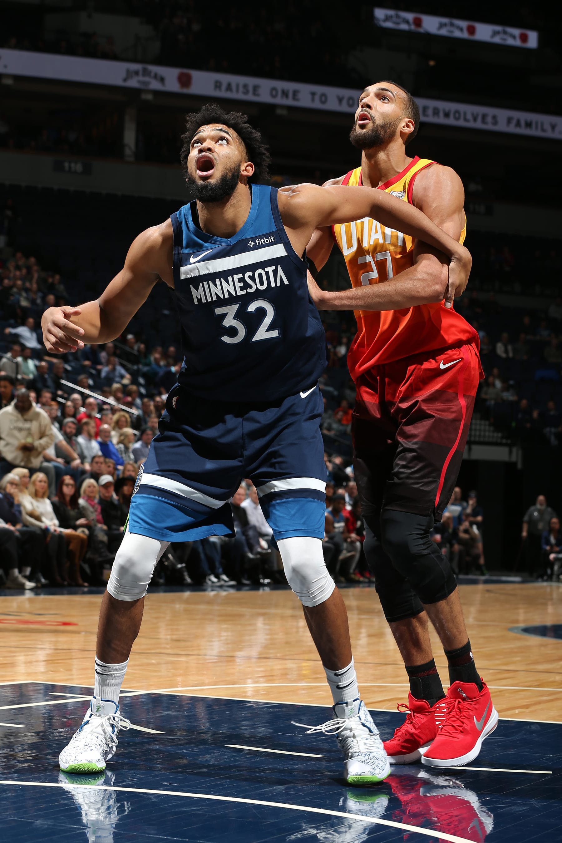 MINNEAPOLIS, MN - DECEMBER 11: Karl-Anthony Towns #32 of the Minnesota Timberwolves boxes out Rudy Gobert #27 of the Utah Jazz on December 11, 2019 at Target Center in Minneapolis, Minnesota. NOTE TO USER: User expressly acknowledges and agrees that, by downloading and or using this Photograph, user is consenting to the terms and conditions of the Getty Images License Agreement. Mandatory Copyright Notice: Copyright 2019 NBAE (Photo by David Sherman/NBAE via Getty Images)