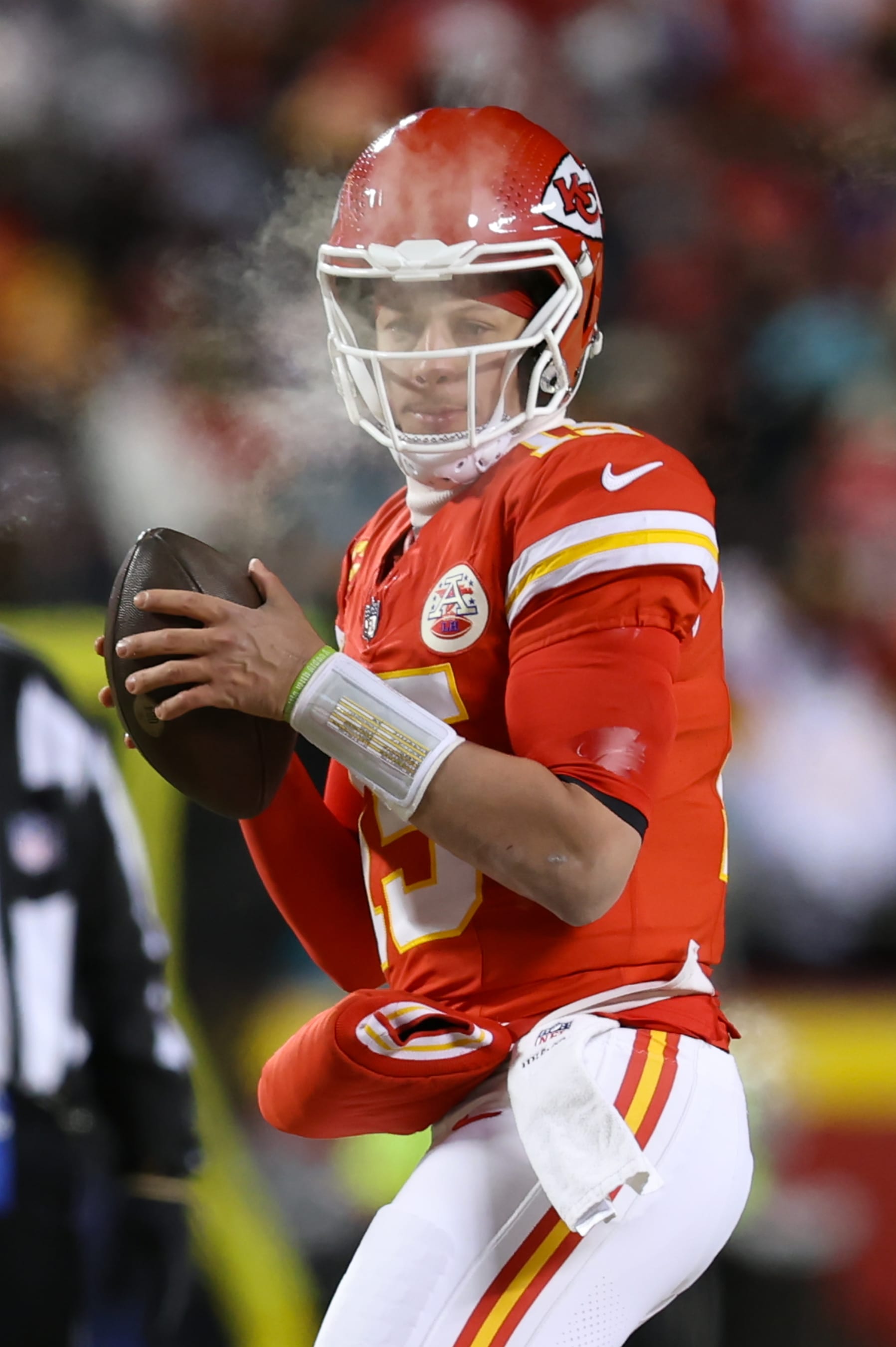 KANSAS CITY, MO - JANUARY 13: Kansas City Chiefs quarterback Patrick Mahomes (15) looks to pass in the brutal cold in the first quarter of an AFC Wild Card playoff game between the Miami Dolphins and Kansas City Chiefs on Jan 13, 2024 at GEHA Field at Arrowhead Stadium in Kansas City, MO. (Photo by Scott Winters/Icon Sportswire via Getty Images) KANSAS CITY, MO - JANUARY 13: Kansas City Chiefs quarterback Patrick Mahomes (15) looks to pass in the brutal cold in the first quarter of an AFC Wild Card playoff game between the Miami Dolphins and Kansas City Chiefs on Jan 13, 2024 at GEHA Field at Arrowhead Stadium in Kansas City, MO. (Photo by Scott Winters/Icon Sportswire via Getty Images)
